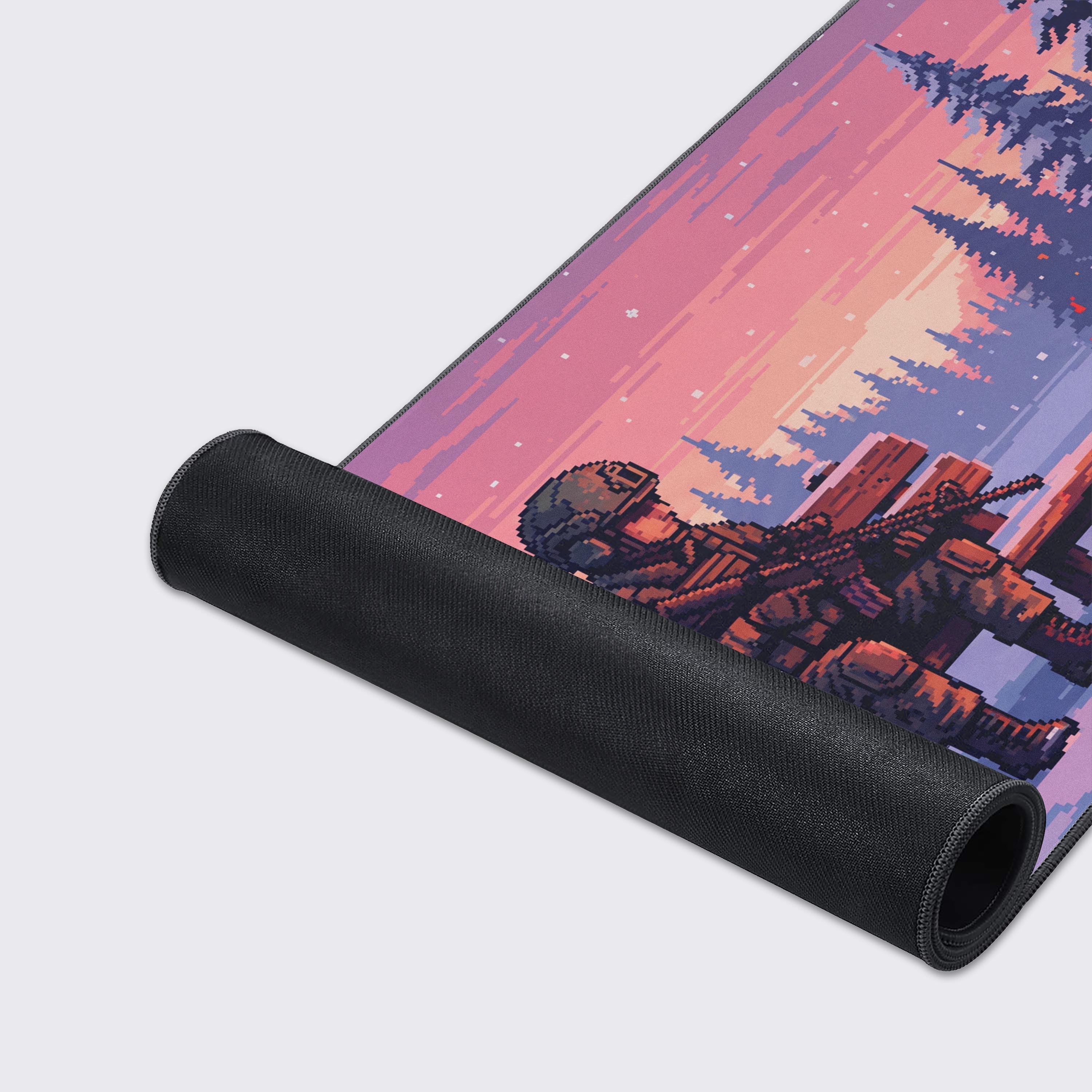 Close-up of the Pixel Respite gaming desk mat, highlighting the durable stitched edges, water-resistant surface, and the non-slip rubber base for stability. - Epic Design Pads & Mousepads
