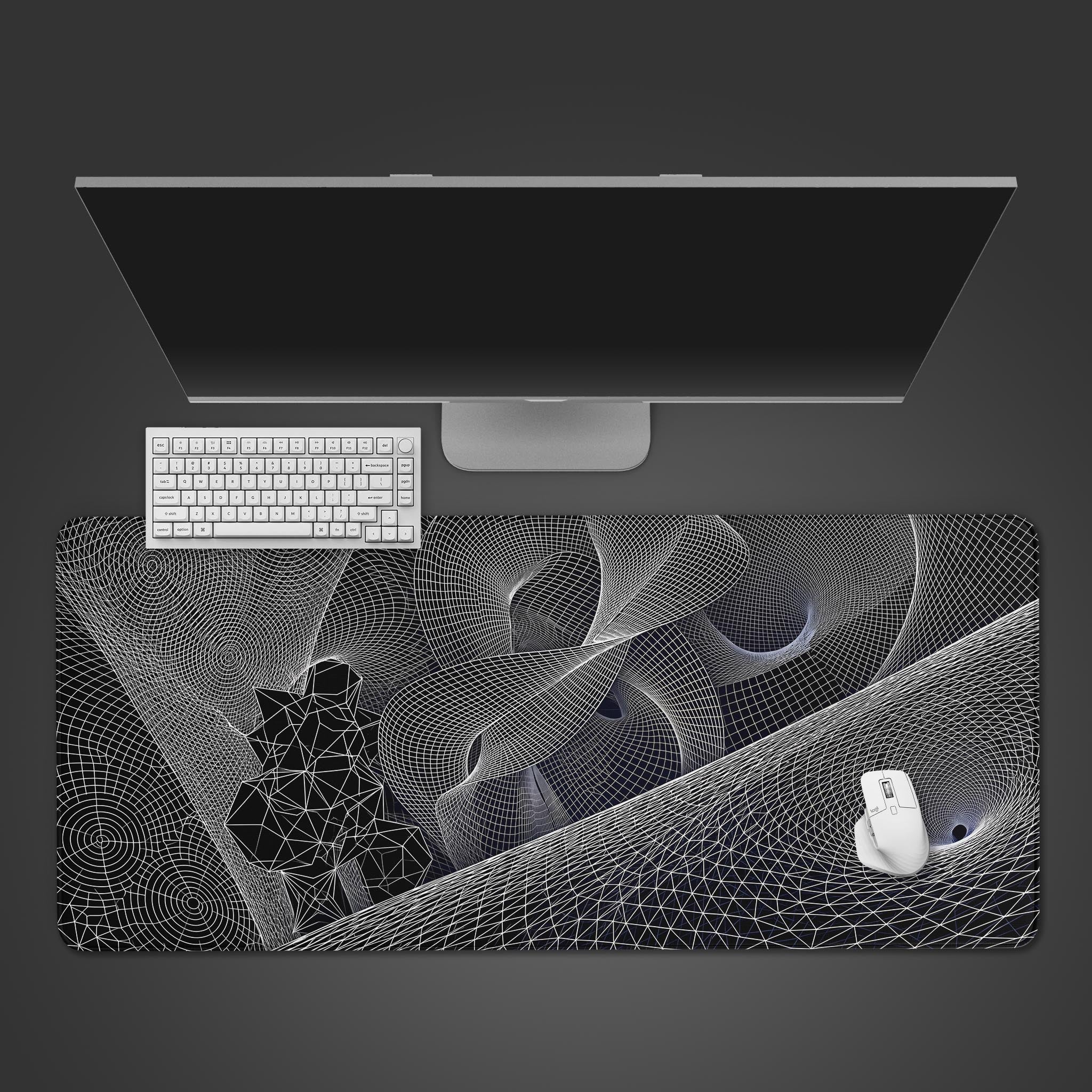 A black and white 3D wireframe desk mat featuring curved mesh lines and sharp geometric crystals.