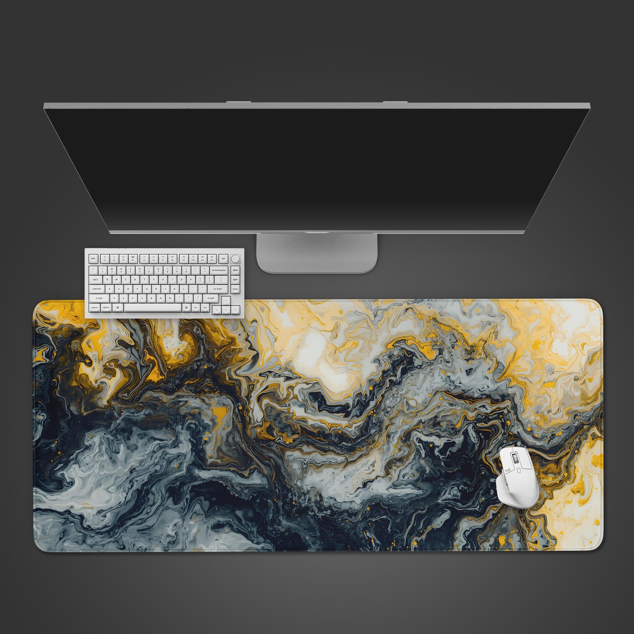 Liquid Gold desk mat with abstract gold and black ink swirl design. Top-down view shows a modern keyboard and mouse on the large mouse pad surface.