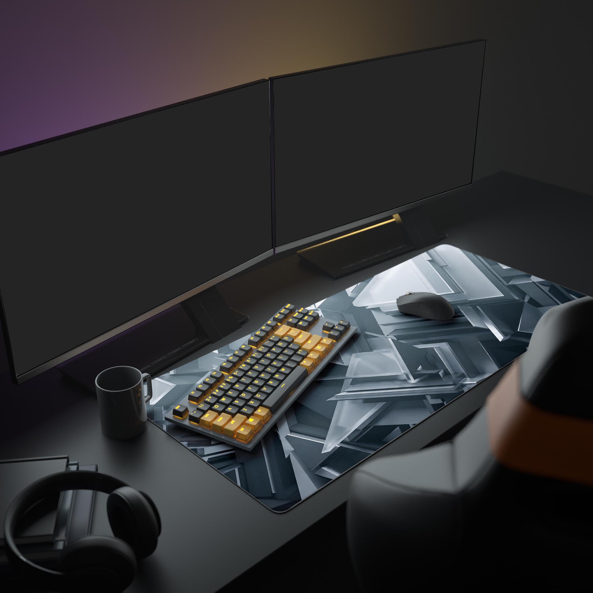 Close-up of the interlocking black and gray geometric shards on the mouse pad
