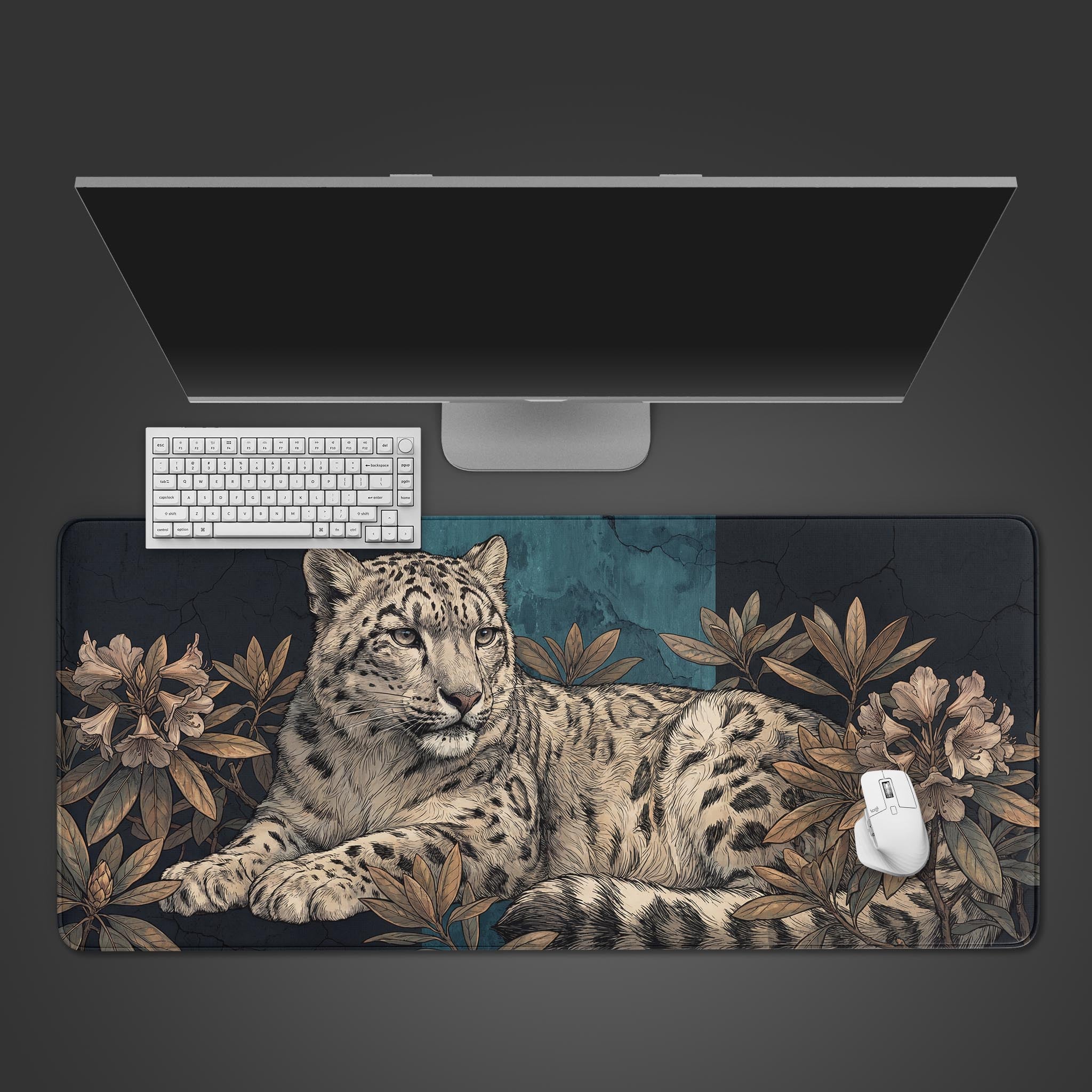 Top-down view of the Alpine Ghost gaming desk mat featuring a snow leopard illustration, shown with a white keyboard and mouse on a dark desk. - Epic Design Pads & Mousepads