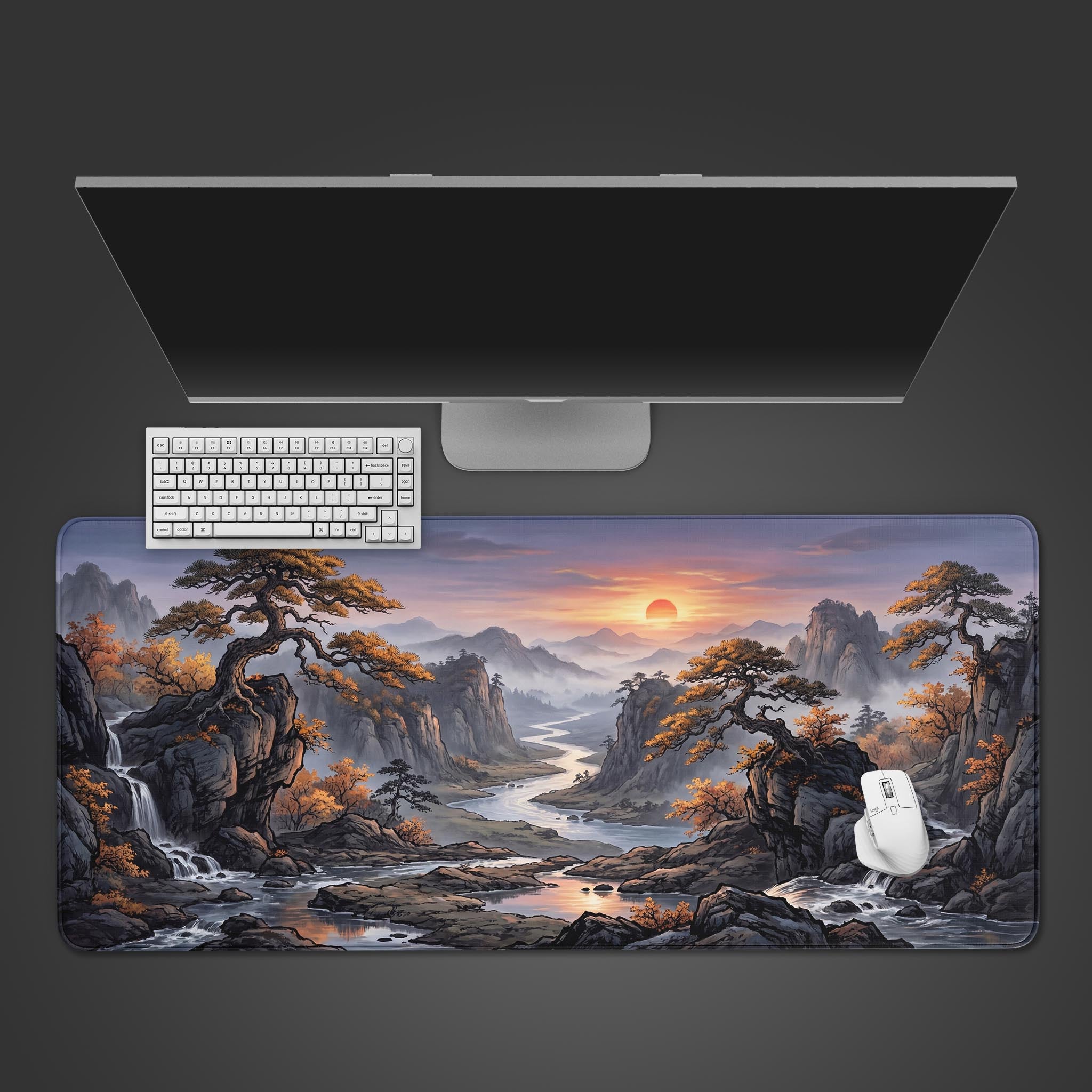 Top-down view of the Amber Horizon gaming desk mat, featuring a Chinese landscape painting, with a white keyboard and mouse on a dark background. - Epic Design Pads & Mousepads