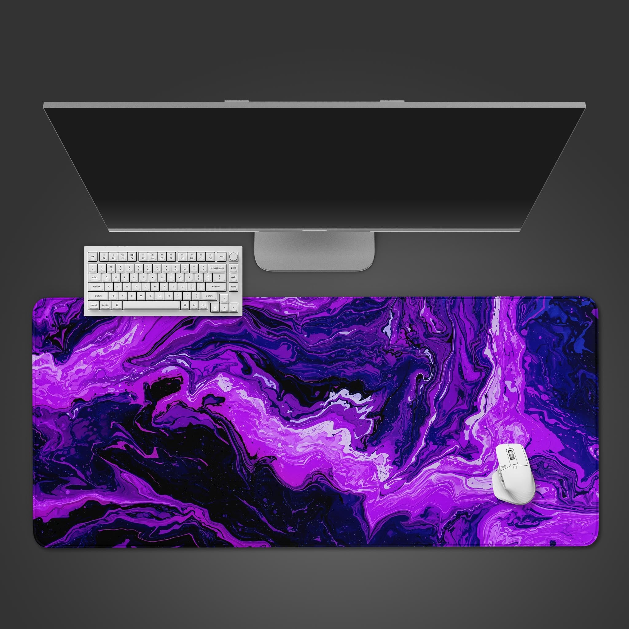Amethyst Liquid desk mat with abstract purple swirl design, shown from a top-down view with a black keyboard and mouse. - Epic Design Pads