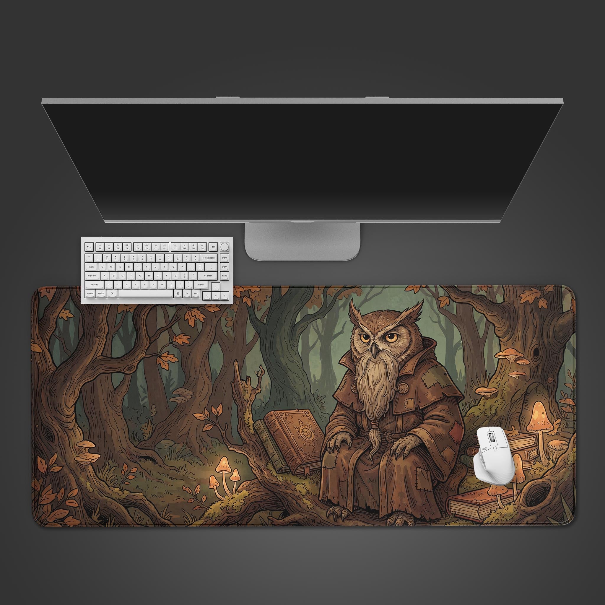 Top-down view of the Ancient Owl Scholar Gaming Desk Mat on a dark desk, featuring a white keyboard, mouse, and a sleek monitor. - Epic Design Pads & Mousepads