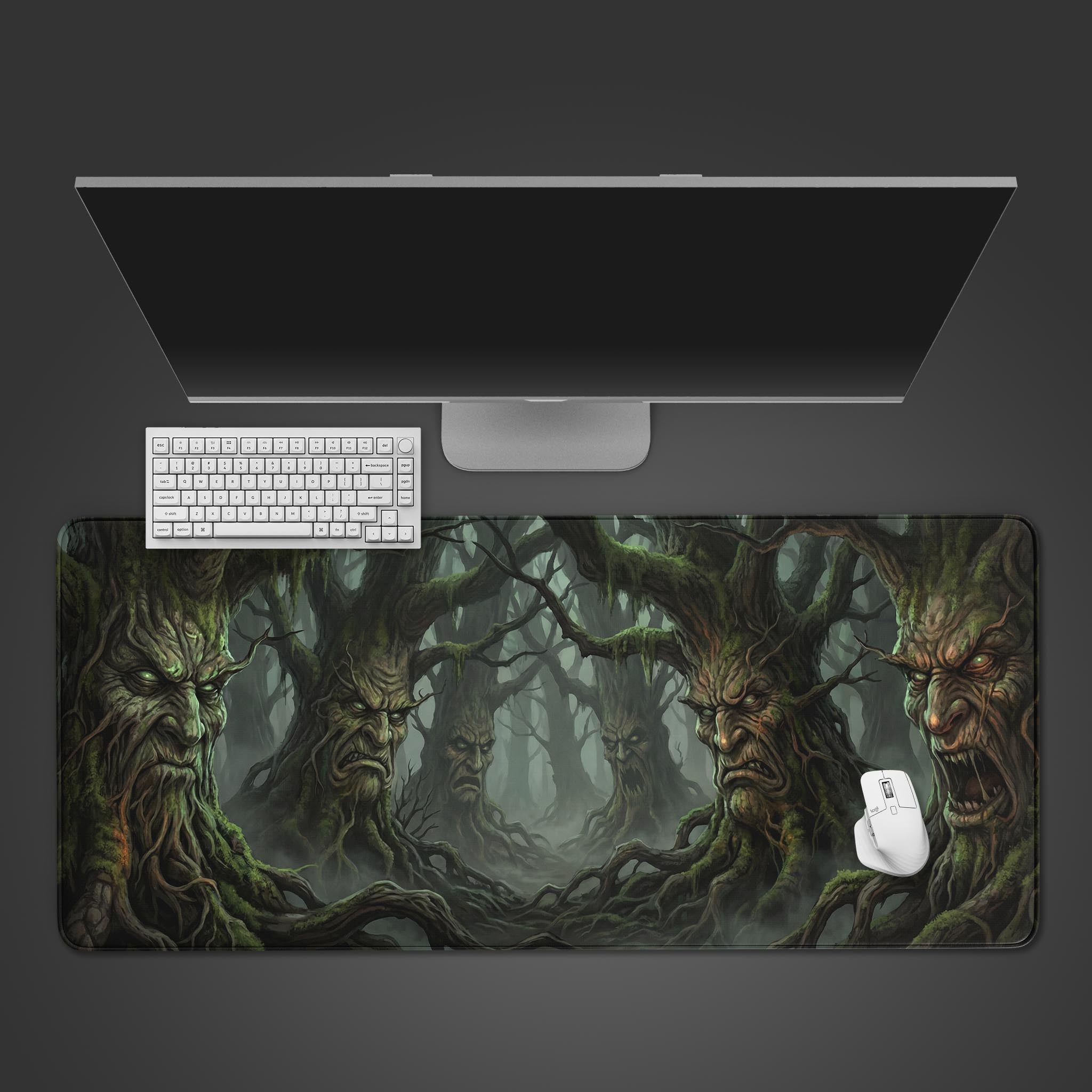 Ancient Watchers gaming desk mat with sentient forest design, shown from a top-down view with a black keyboard and gaming mouse. - Epic Design Pads & Mousepads