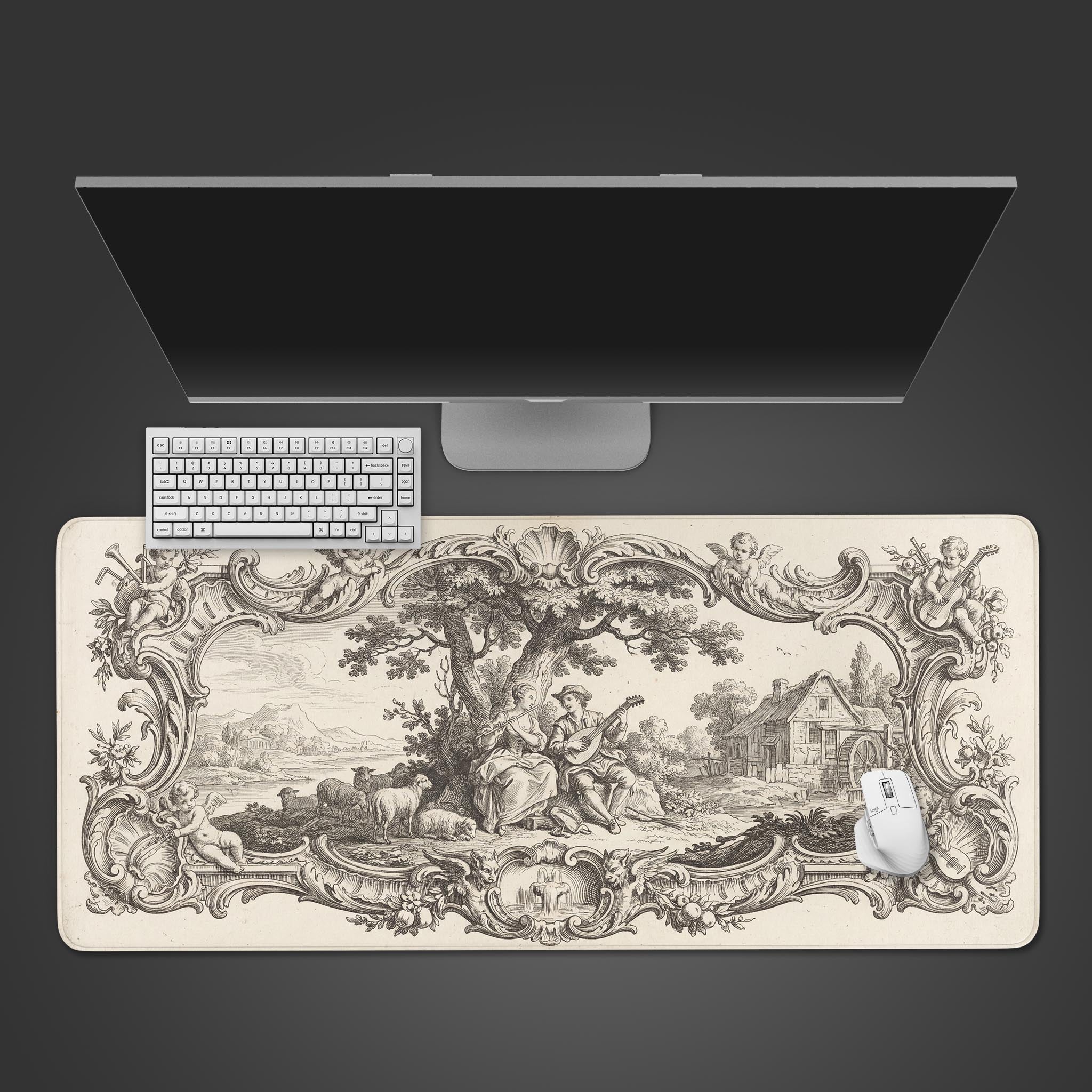 Top-down view of the Baroque Garden gaming desk mat featuring a vintage black and white pastoral scene. A white keyboard and mouse are on the mat below a monitor. - Epic Design Pads & Mousepads