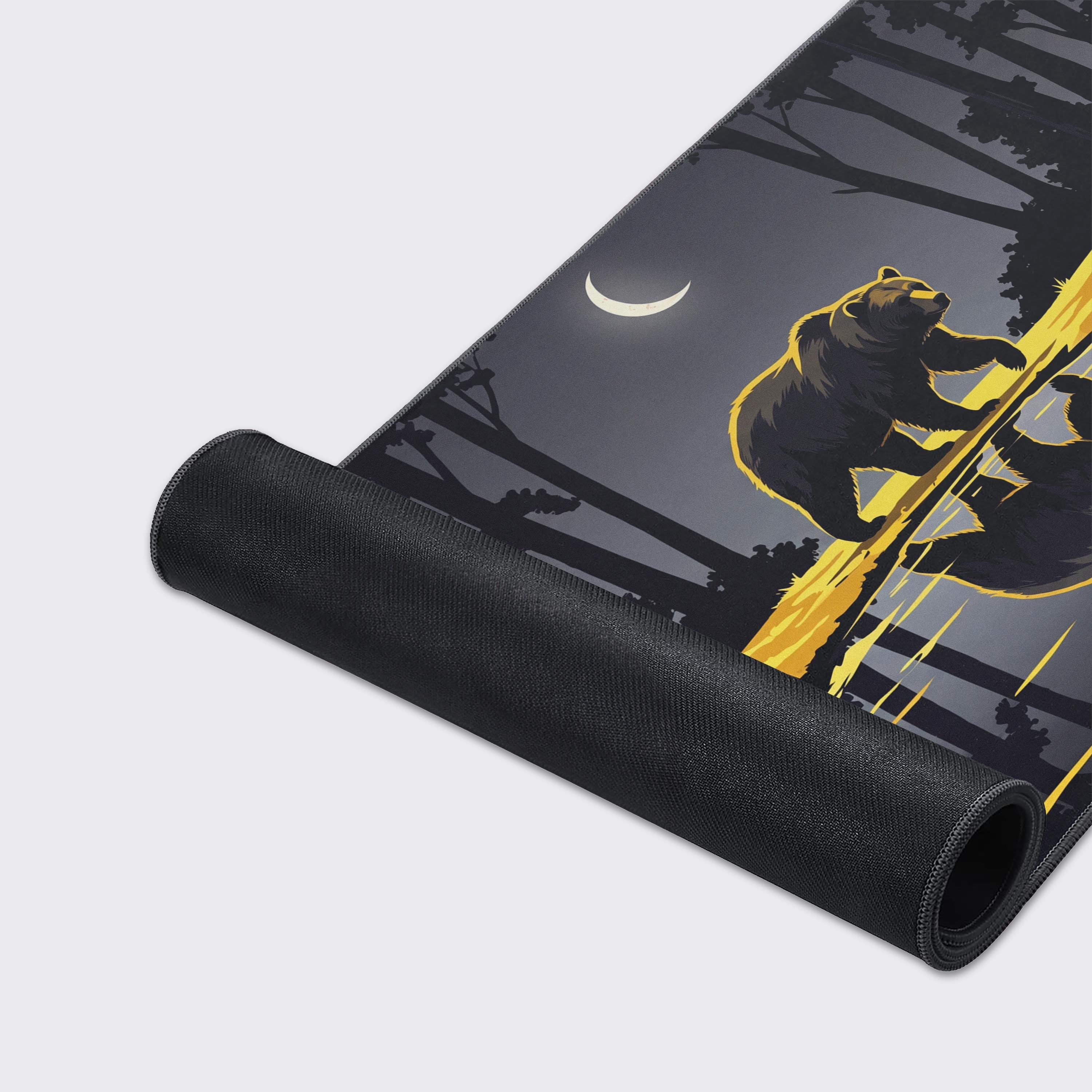 Detail of the glowing crescent moon and silhouette trees in the background of the nocturnal wildlife mat