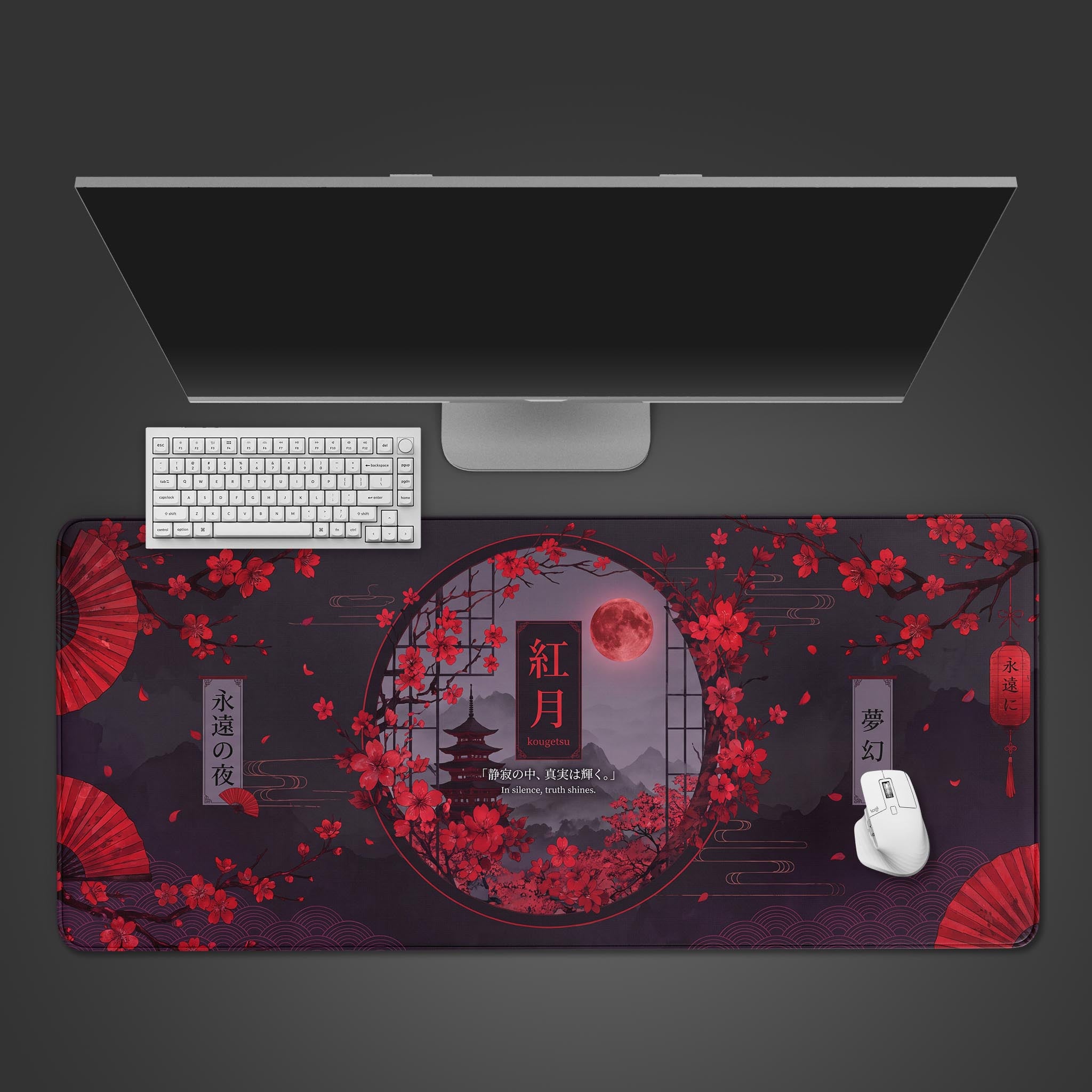 A dark desk mat featuring a bright red blood moon, a silhouetted pagoda, and vibrant cherry blossoms within a circular frame.