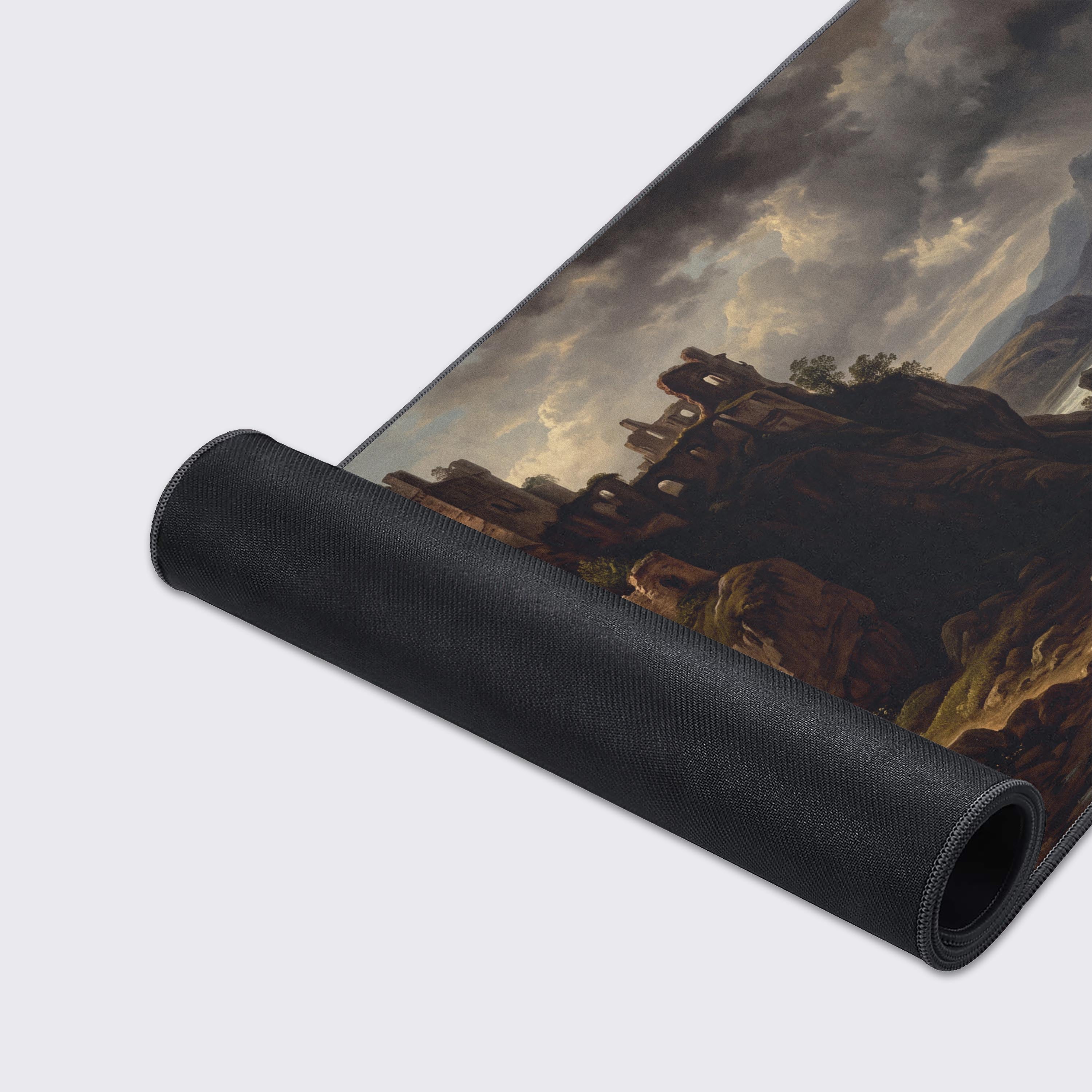 Close-up view of the majestic fortress perched on a rocky mountain surrounded by green foliage on the desk mat.