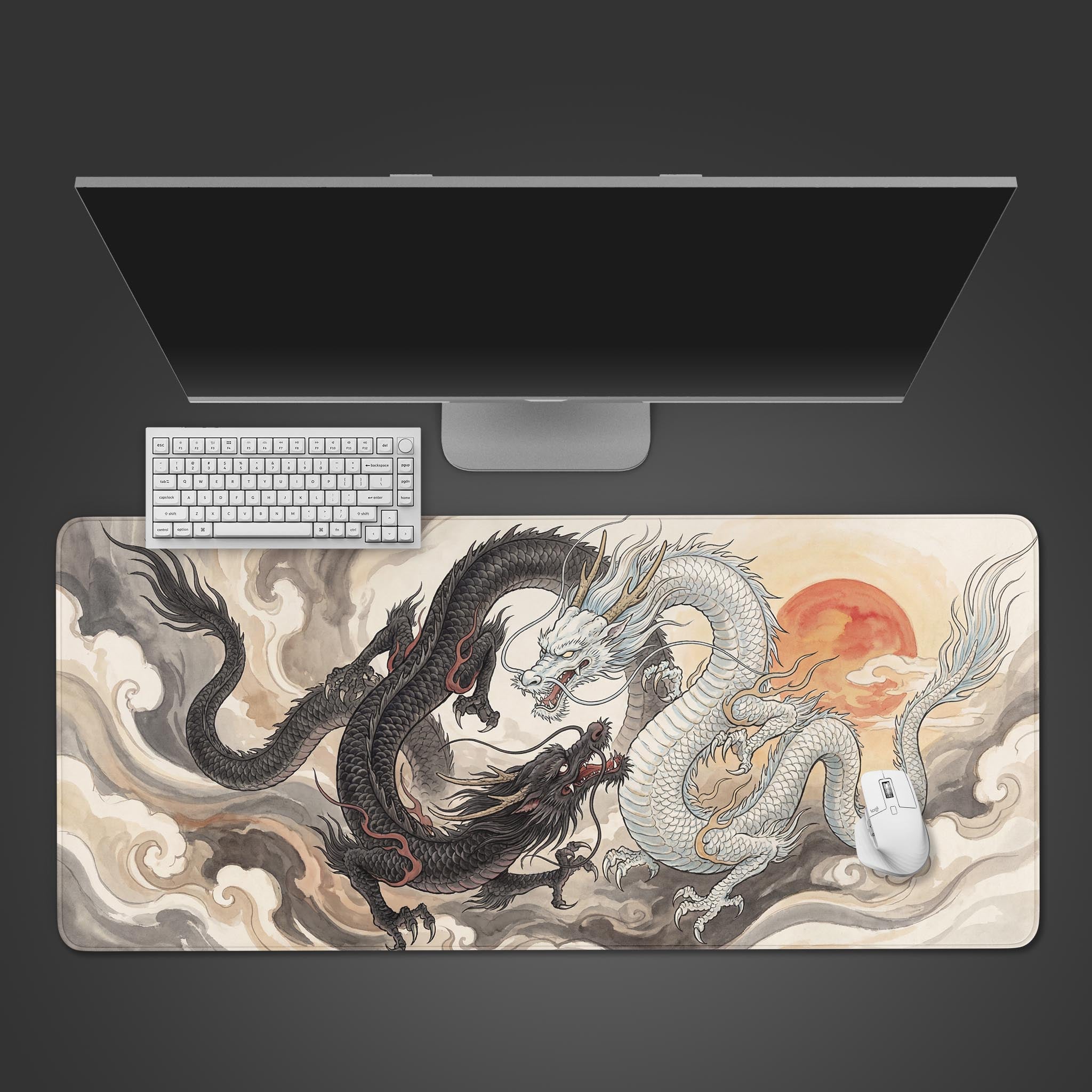 Top-down view of the Celestial Duality dragon Gaming Desk Mat, shown with a white keyboard, mouse, and a large monitor on a dark surface. - Epic Design Pads & Mousepads