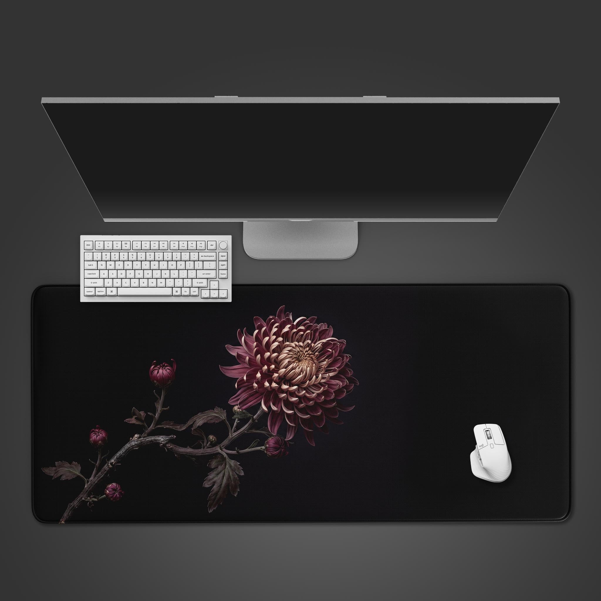 Midnight Chrysanthemum dark floral desk mat featuring a deep burgundy bloom on a black background