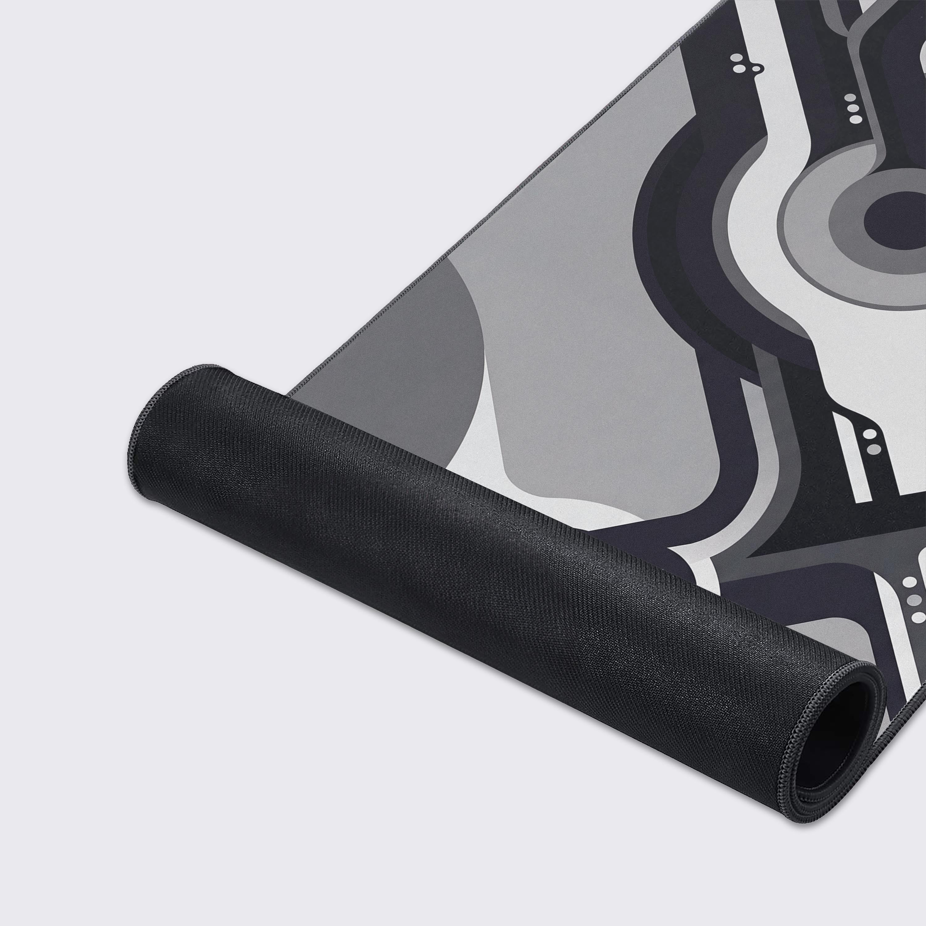 Waterproof and smooth surface details of the tech-inspired desk mat.