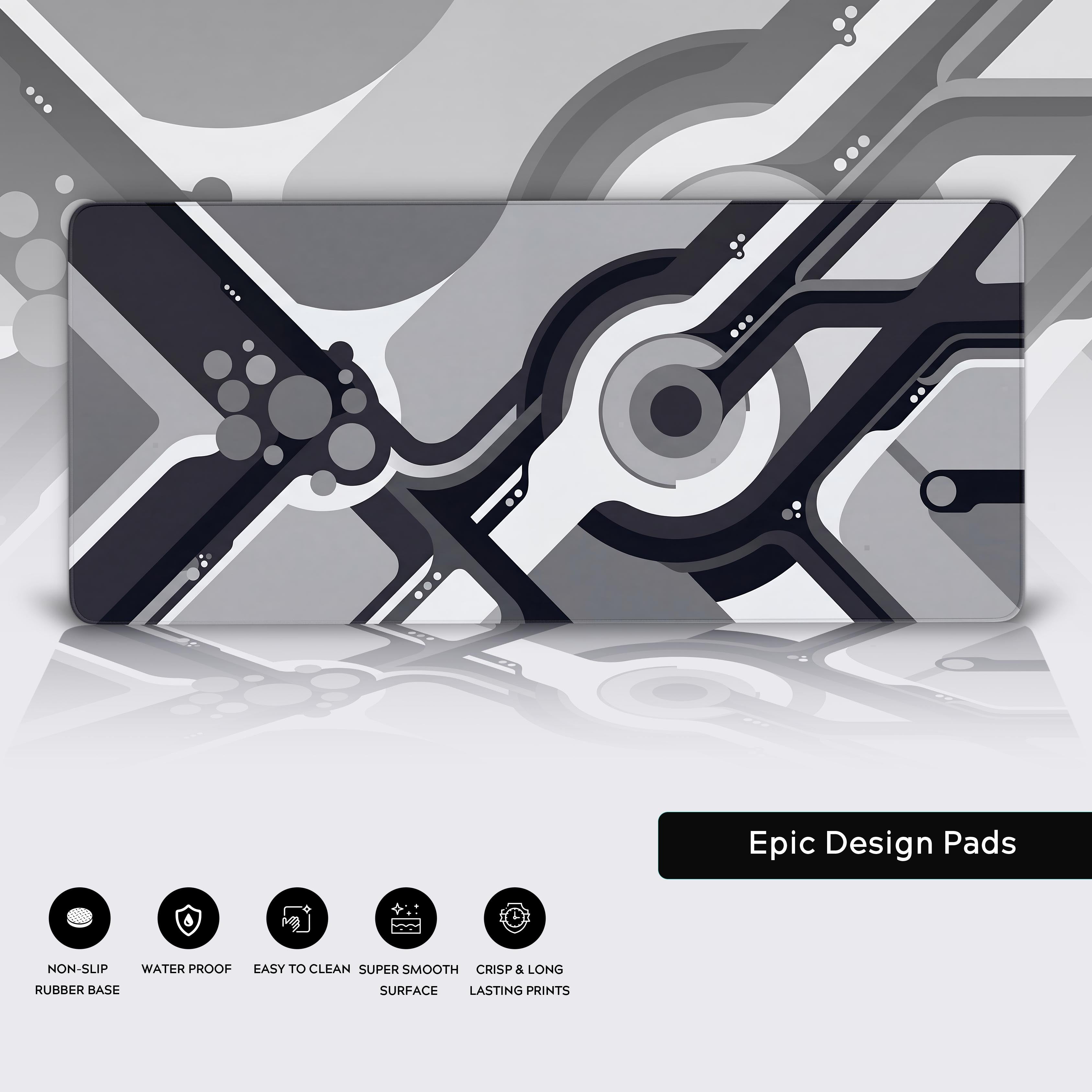 Full view of the grayscale abstract geometric desk mat anchoring a modern workspace.