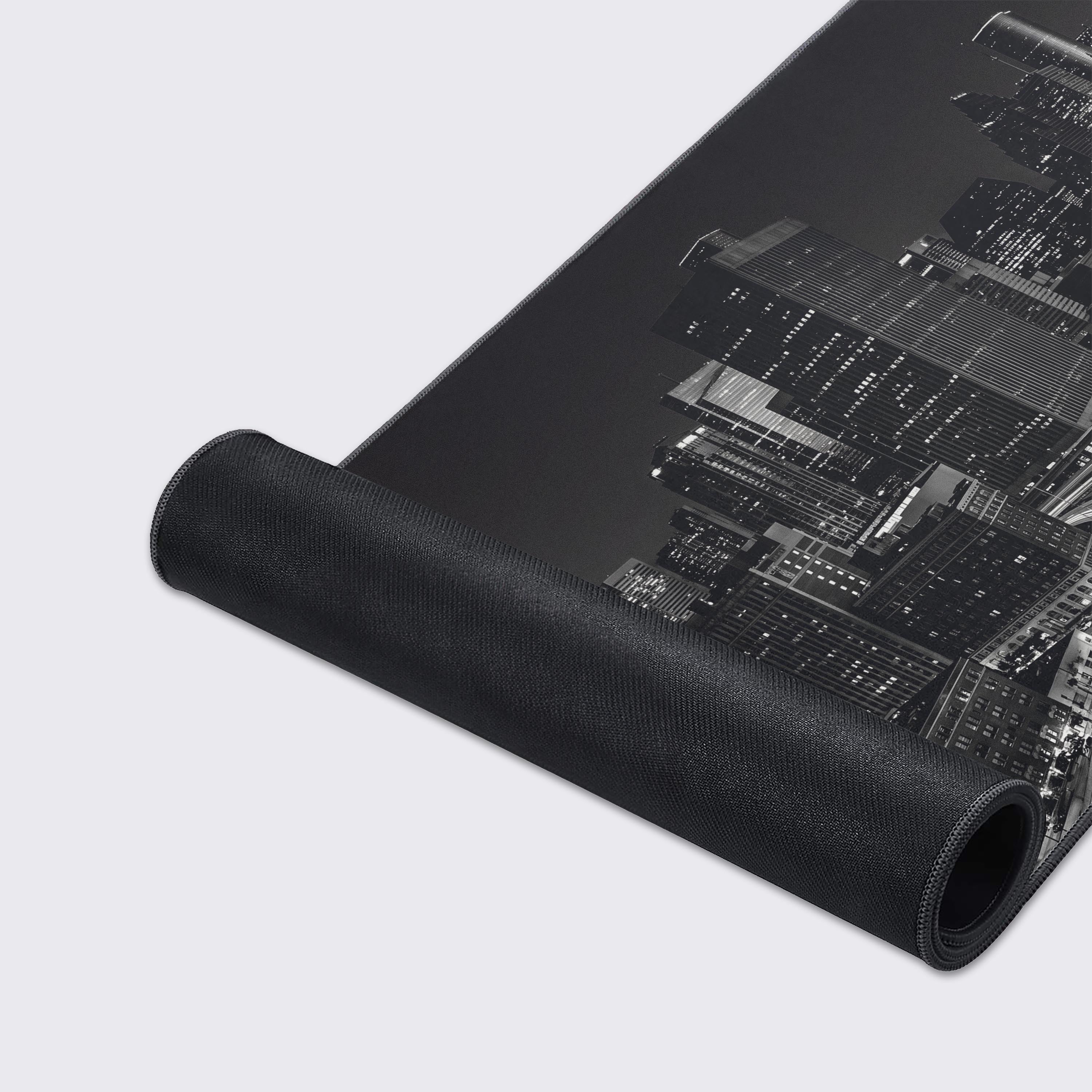 The desk mat hovering over a faded reflection, emphasizing the wide panoramic view of the urban metropolis.