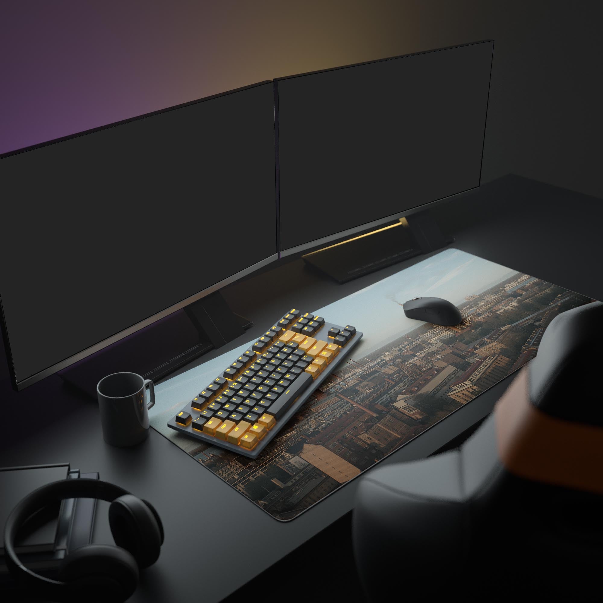 Large industrial desk mat featuring the City's Breath design – shown in an office setup with dual monitors, a mechanical keyboard, and headphones. - Epic Design Pads & Mousepads