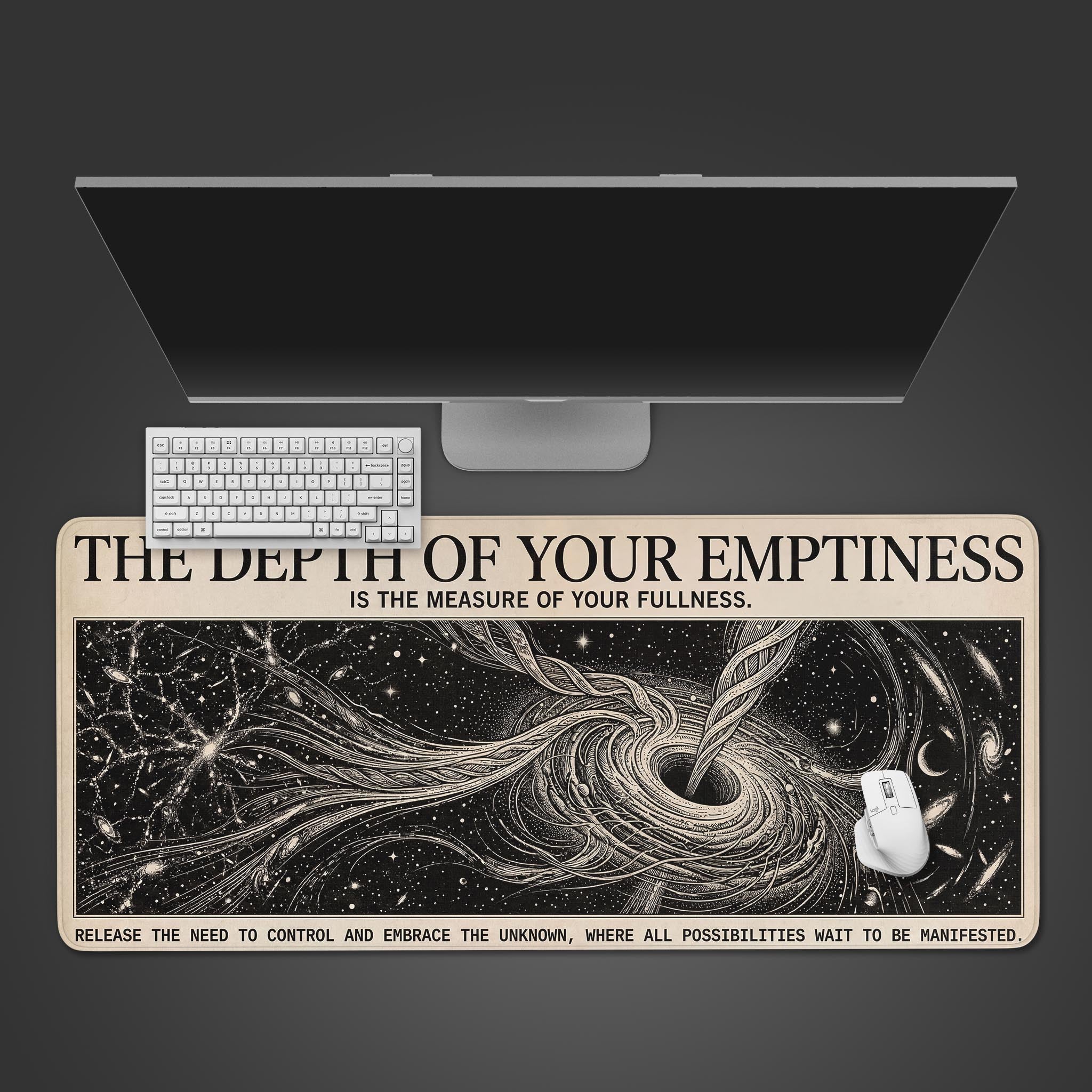Top-down view of the Cosmic Emptiness gaming desk mat featuring a black hole design, shown with a white mechanical keyboard and mouse. - Epic Design Pads & Mousepads