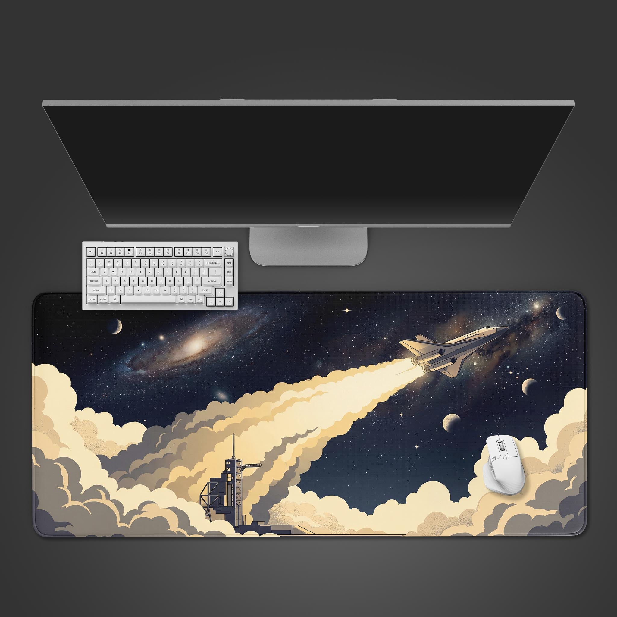 Top-down view of the Cosmic Launch gaming desk mat featuring a space shuttle design, shown with a white keyboard and mouse on a dark surface. - Epic Design Pads & Mousepads