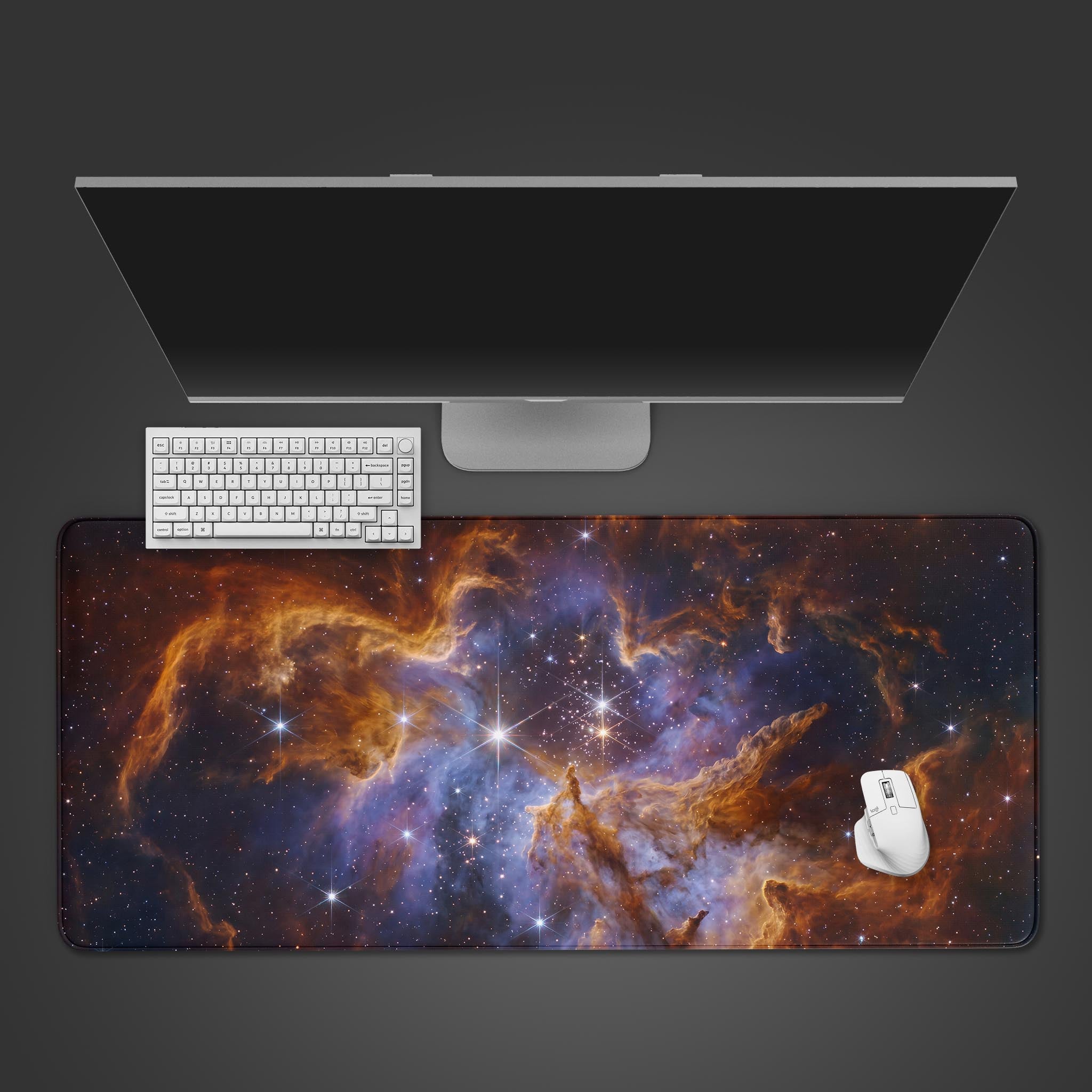 Cosmic Nebula XL gaming desk mat featuring swirling orange and blue galactic dust