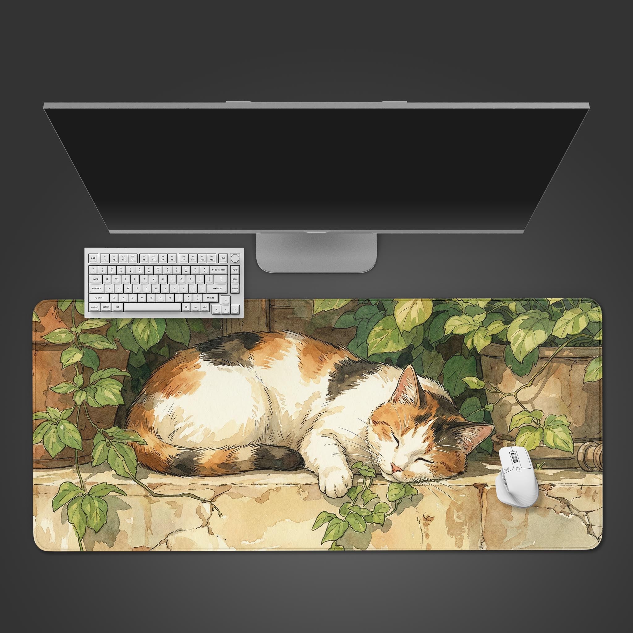 Cozy Calico cat desk mat with a sleeping cat design. Shown from a top-down desktop view with a white keyboard and mouse. - Epic Design Pads & Mousepads