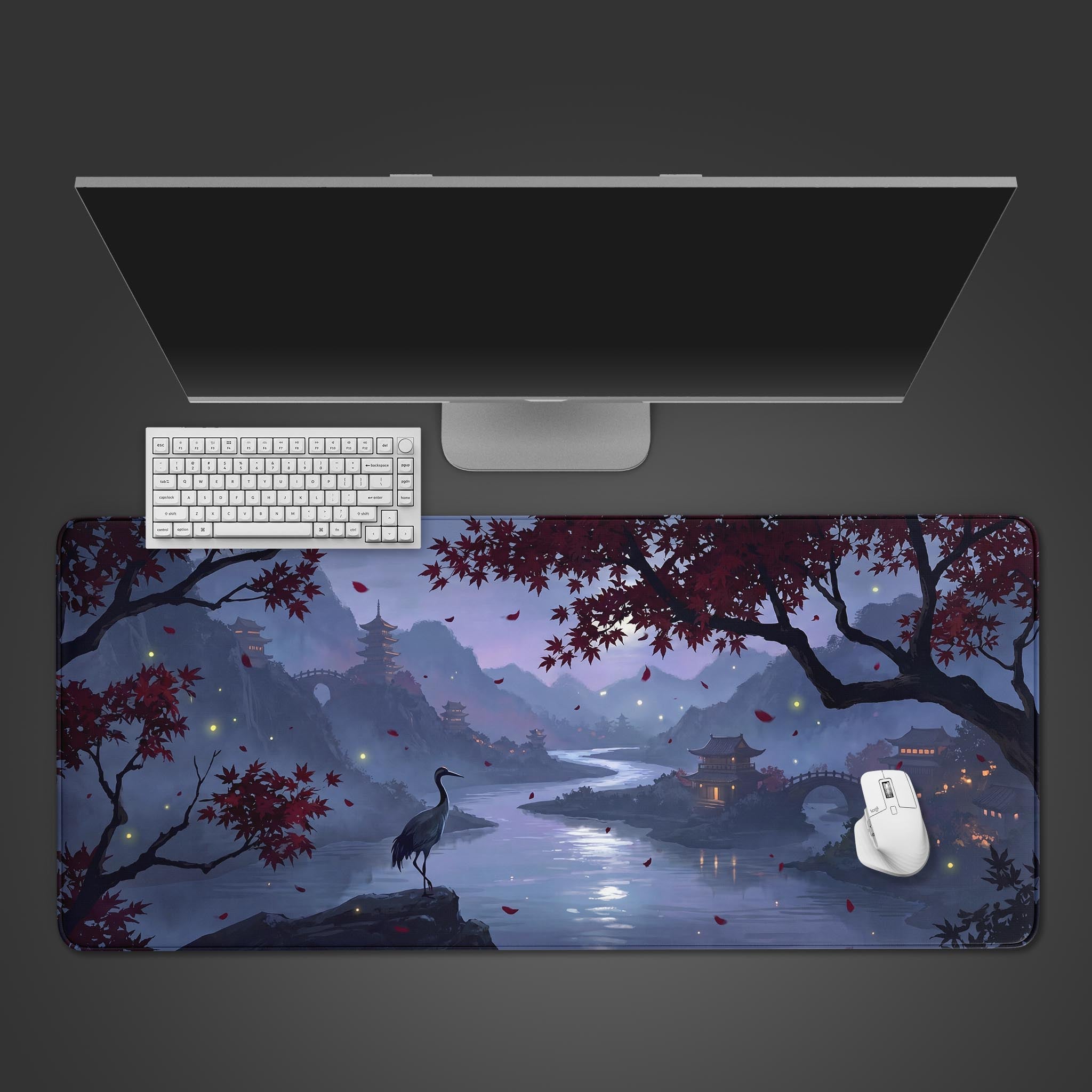 Twilight serene landscape desk mat featuring an elegant crane standing by a winding river