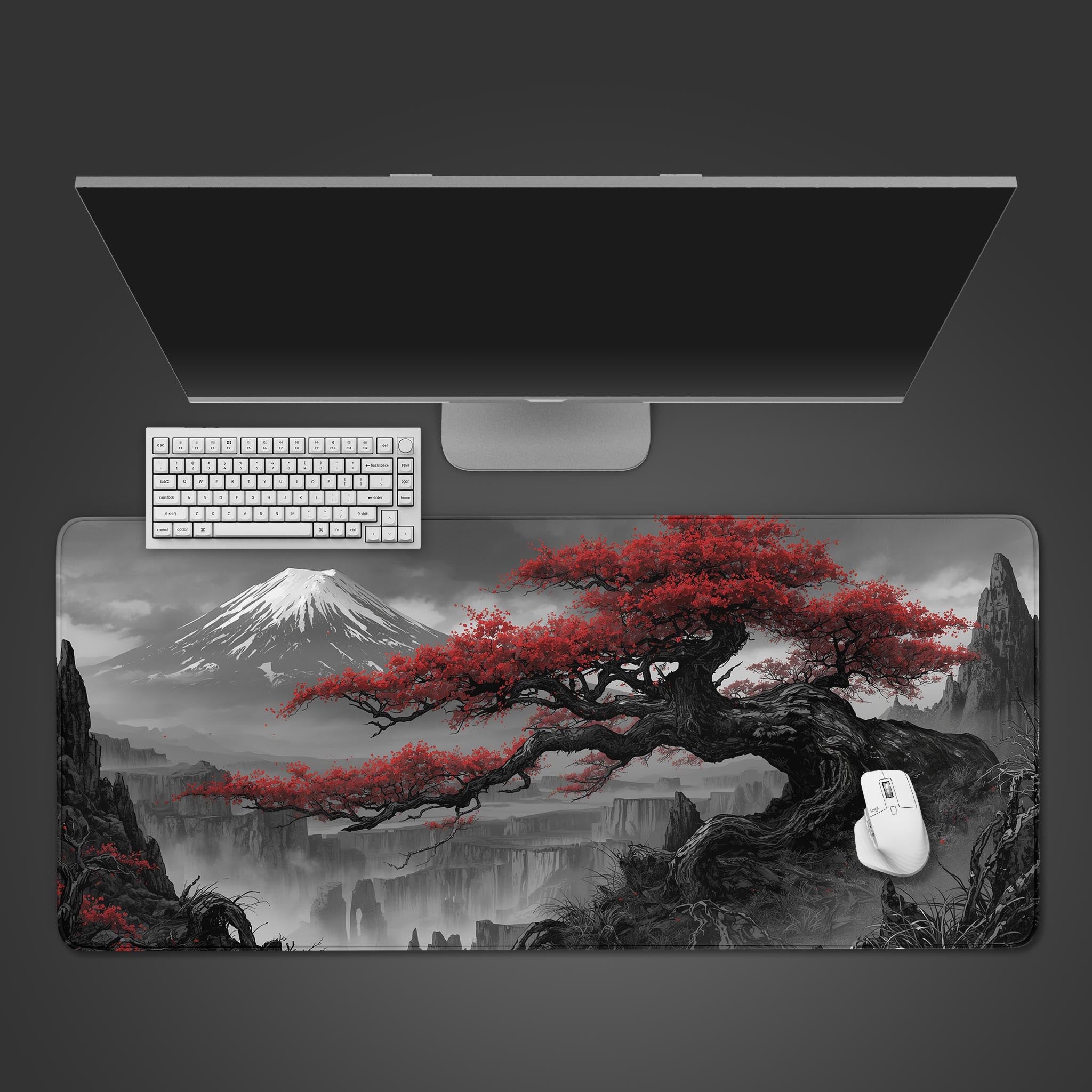 Crimson Peaks Japanese desk mat with red tree and Mount Fuji design – top-down view on a desk with a keyboard and mouse. - Epic Design Pads