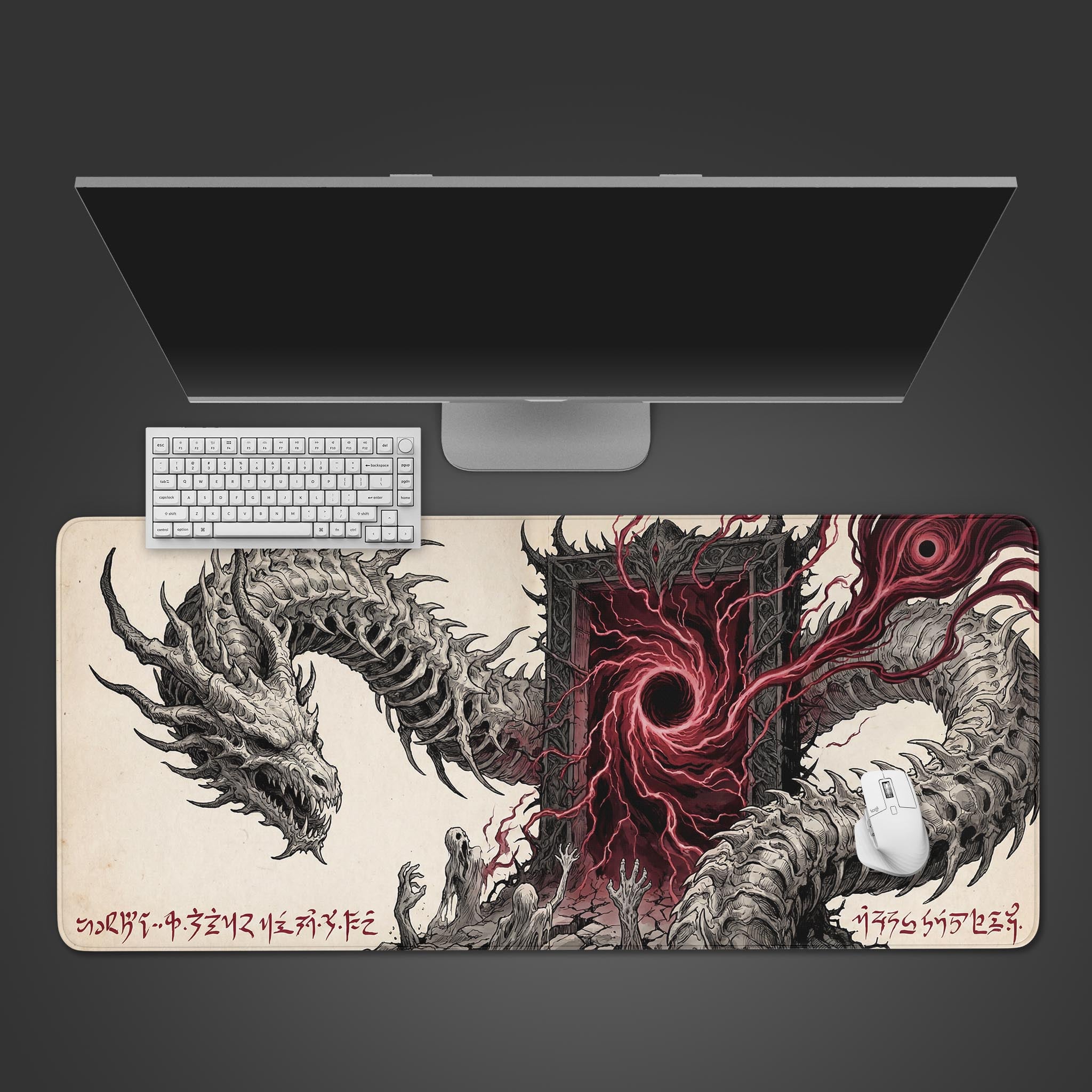 The Crimson Portal gaming desk mat, shown from above with a white keyboard and mouse. The skeletal dragon design wraps around a swirling red vortex in the center. - Epic Design Pads & Mousepads