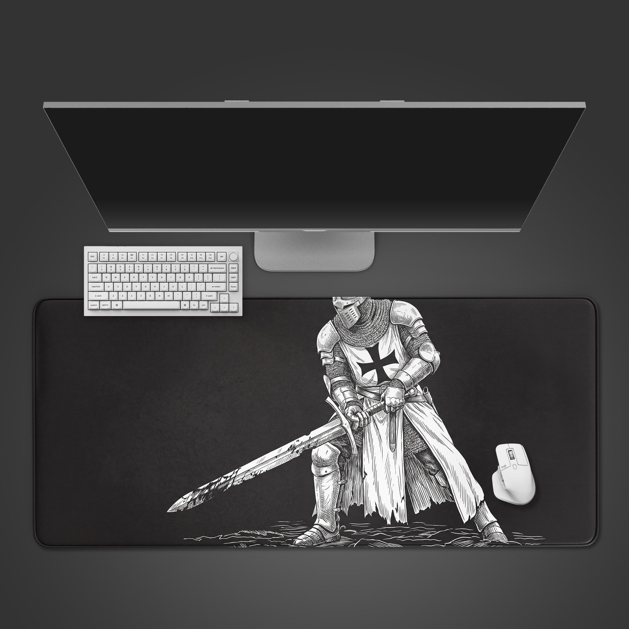 Top-down view of the Crusader's Stance gaming desk mat on a dark desk, featuring a Templar knight design, with a white keyboard and mouse. - Epic Design Pads & Mousepads