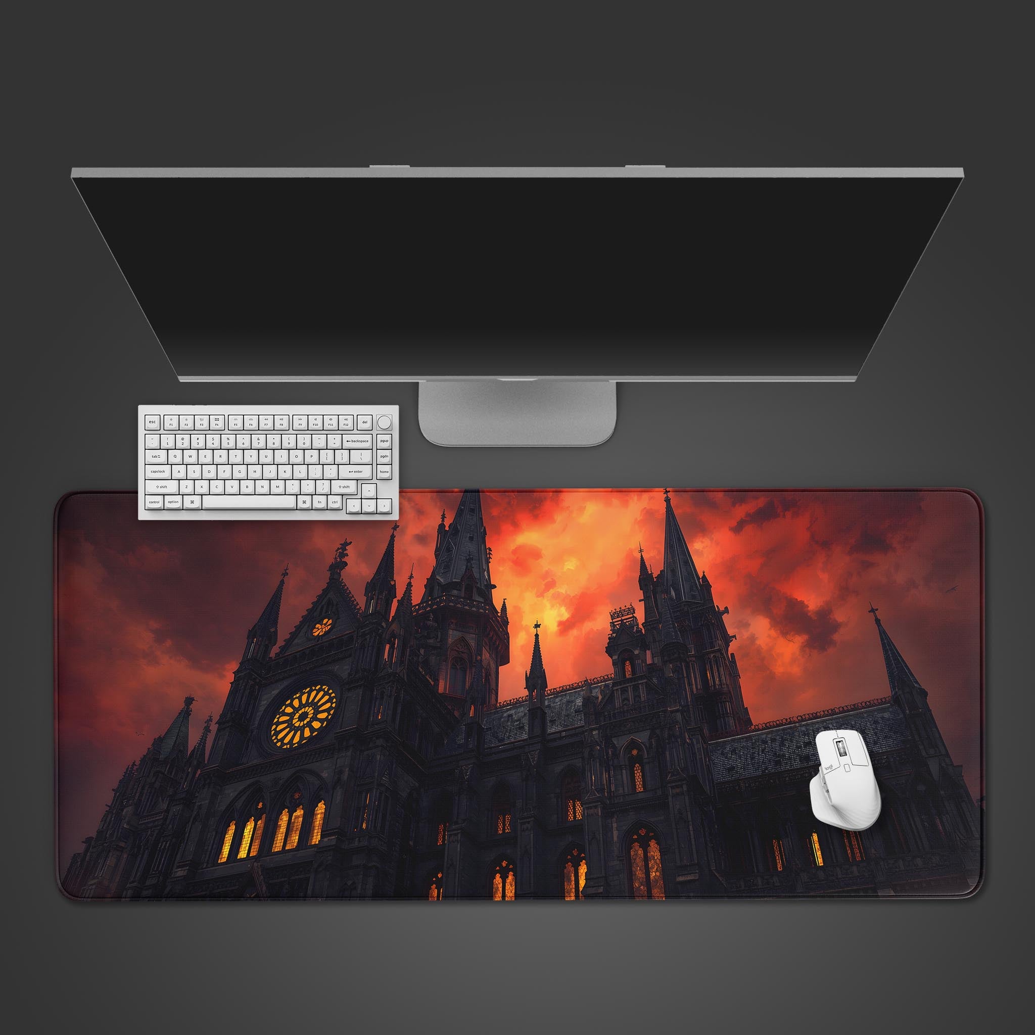Dark Cathedral gothic desk mat with fiery sky design, viewed from above on a desk with a gaming keyboard and mouse. - Epic Design Pads & Mousepads