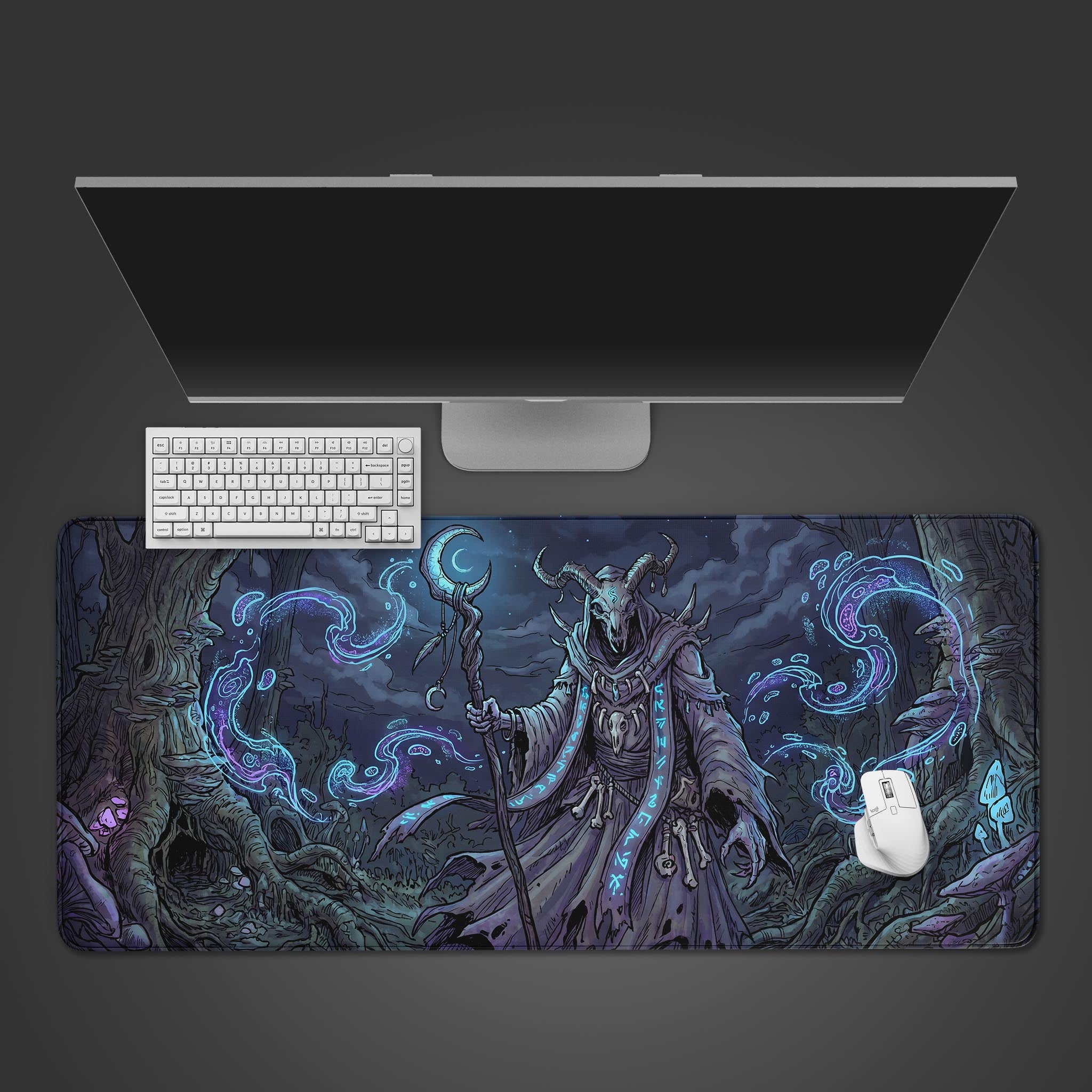 A dark fantasy desk mat featuring a demonic skeletal wizard casting glowing blue magic in a haunted forest.