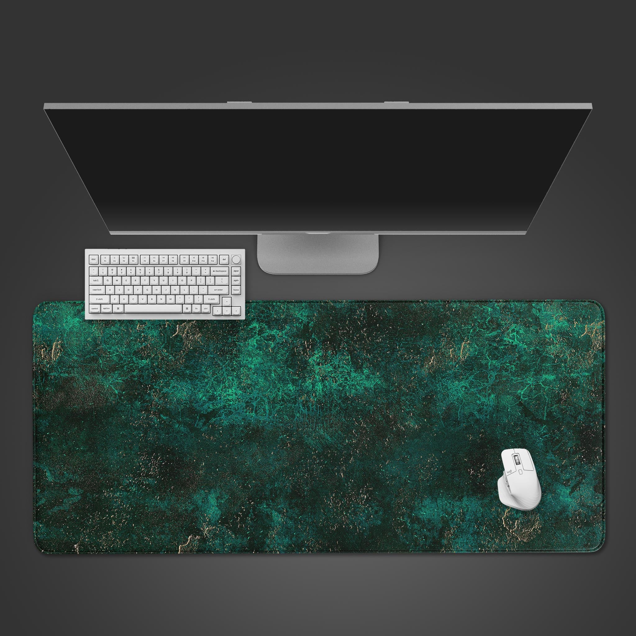 Emerald Stone desk mat with an abstract green and gold marble design, shown in a top-down view with a keyboard and mouse. - Epic Design Pads & Mousepads