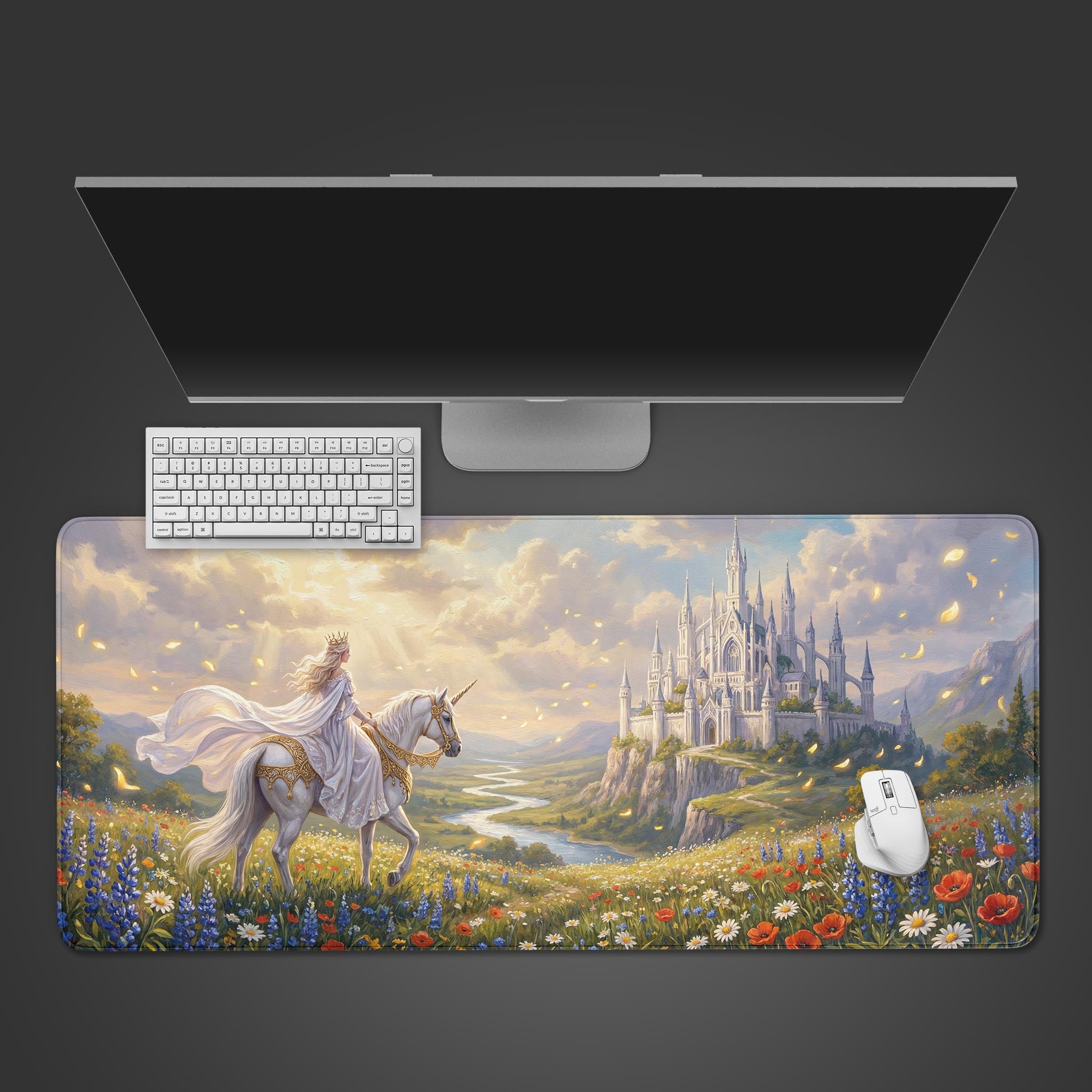 Top-down view of the Ethereal Kingdom gaming desk mat featuring a princess on a unicorn. A white keyboard and mouse are placed on the mat below a monitor. - Epic Design Pads & Mousepads