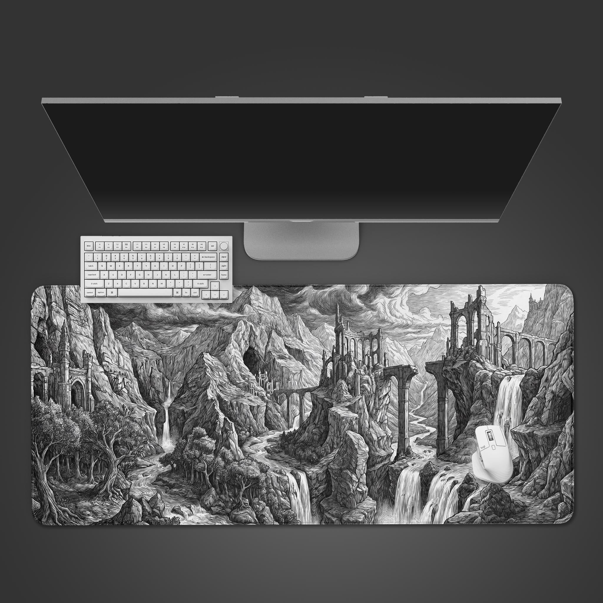 Epic black and white fantasy ruins desk mat featuring mountains and waterfalls