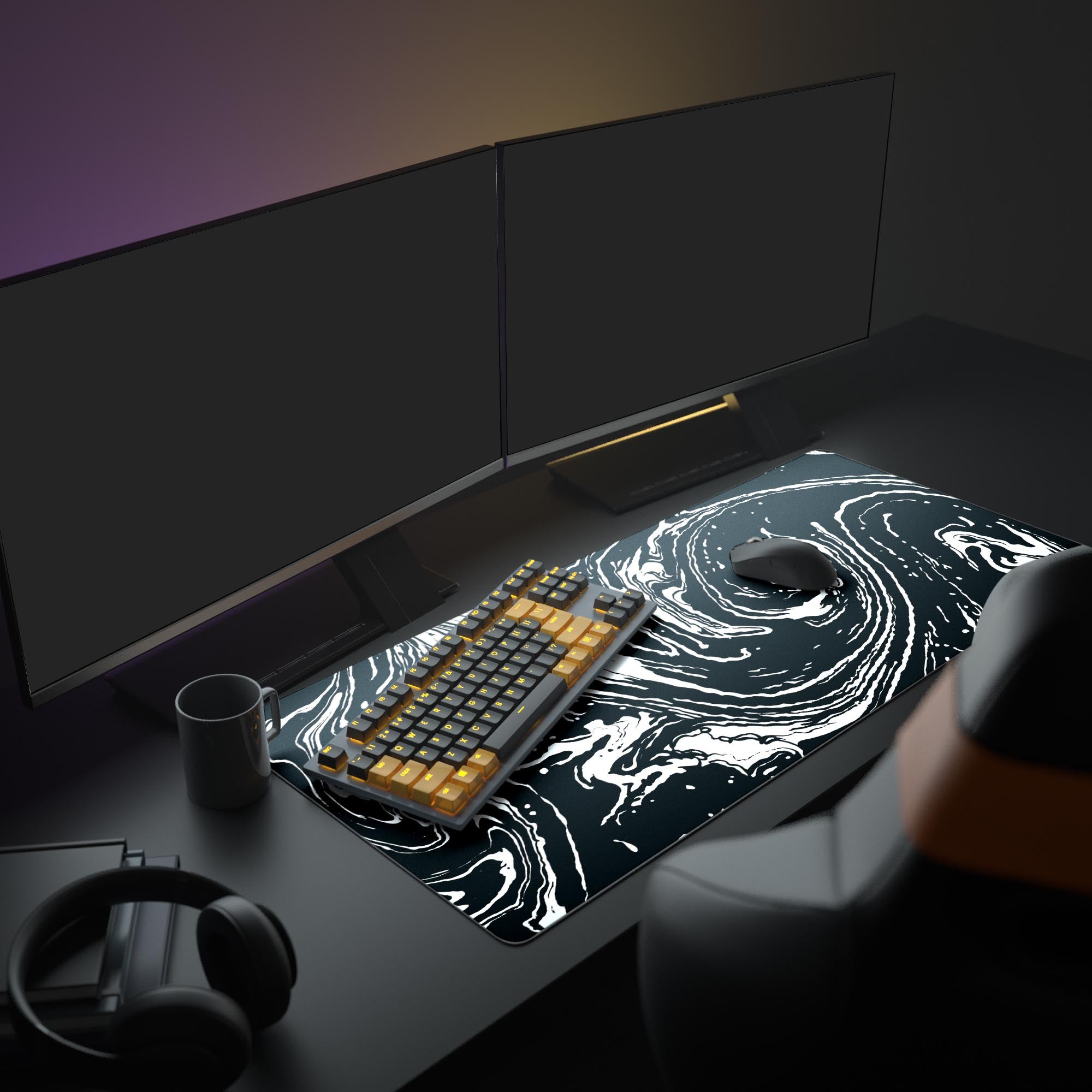Close-up of the monochrome desk mat showing high-contrast white paint swirls over a deep black background.