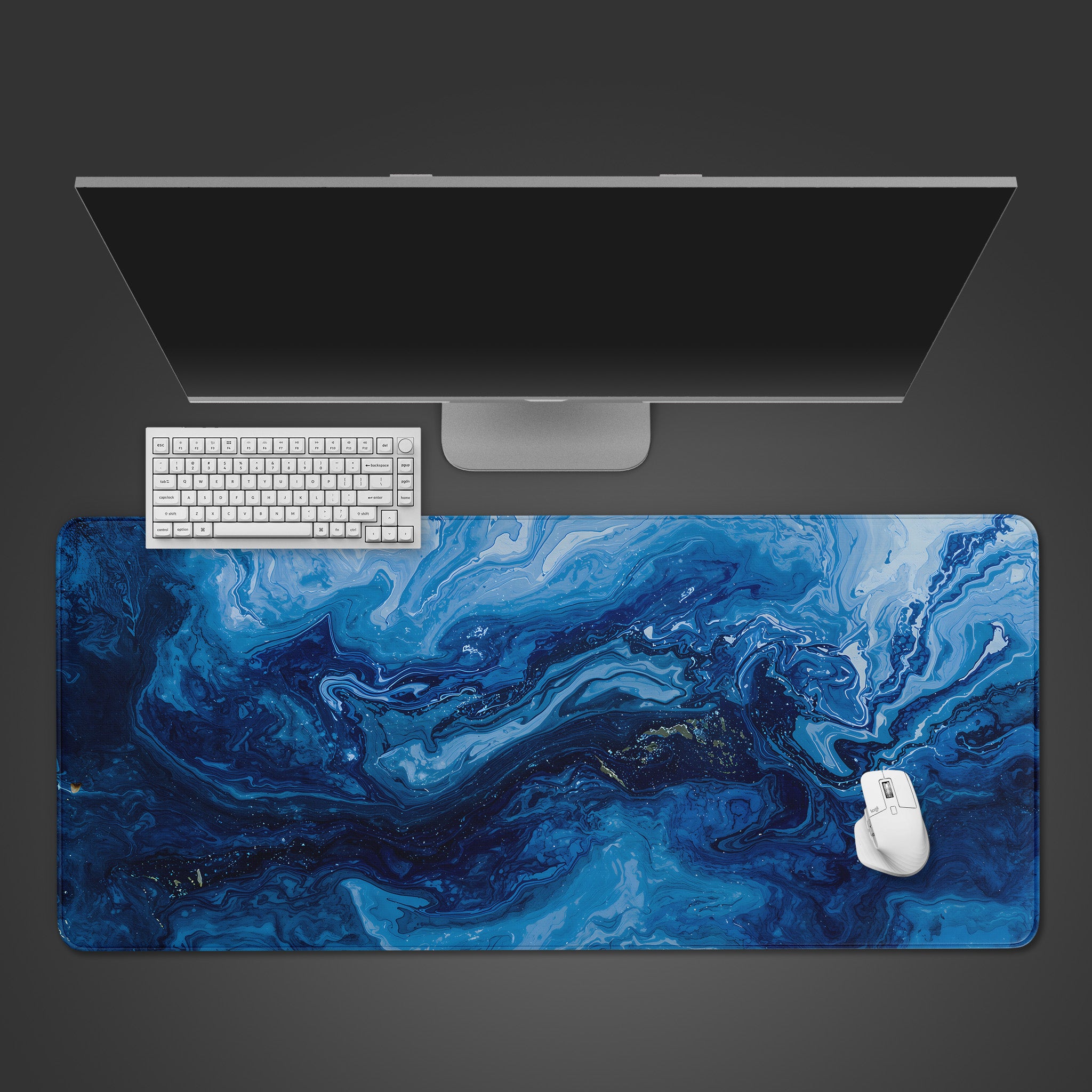 A mesmerizing blue fluid art desk mat with swirling marble patterns