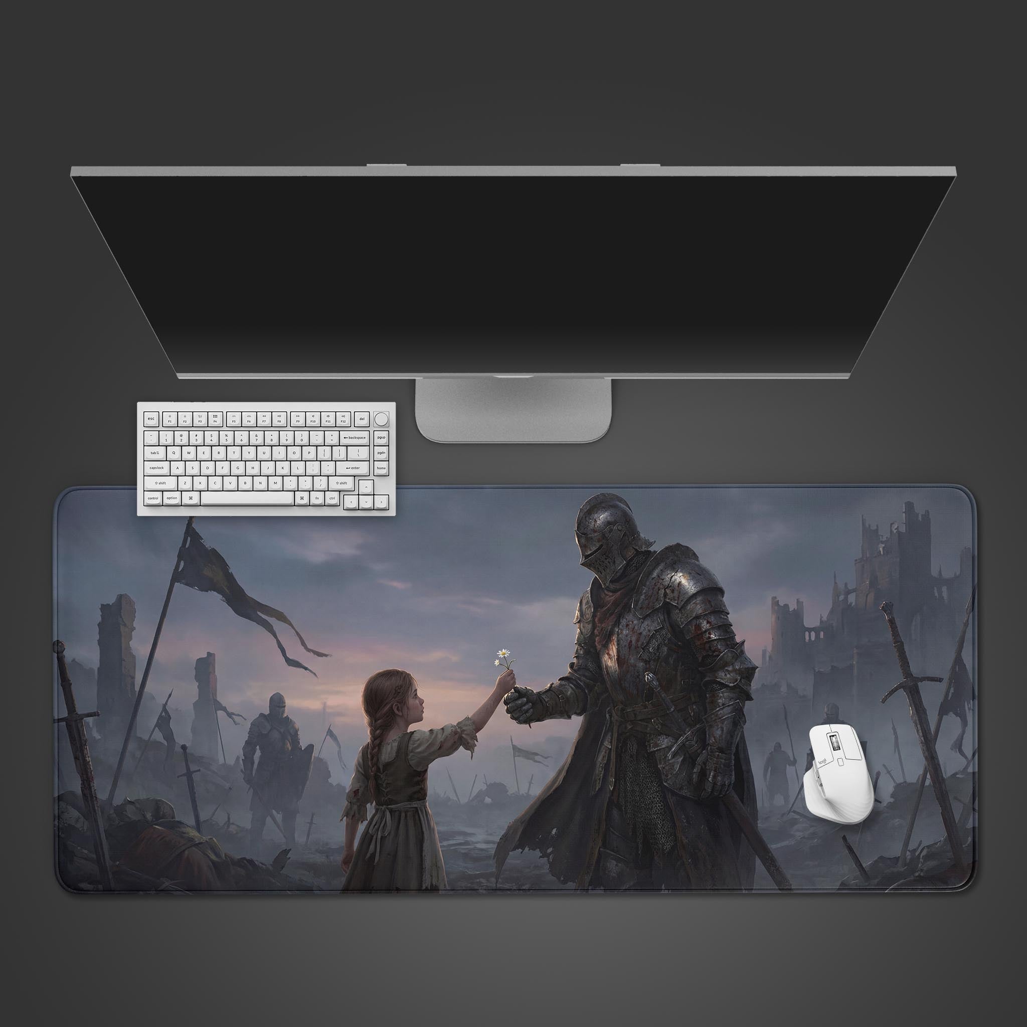 A top-down view of the 'Forgotten Promise' Gaming Desk Mat, featuring a knight and a child, displayed on a desk with a white keyboard and mouse. - Epic Design Pads & Mousepads
