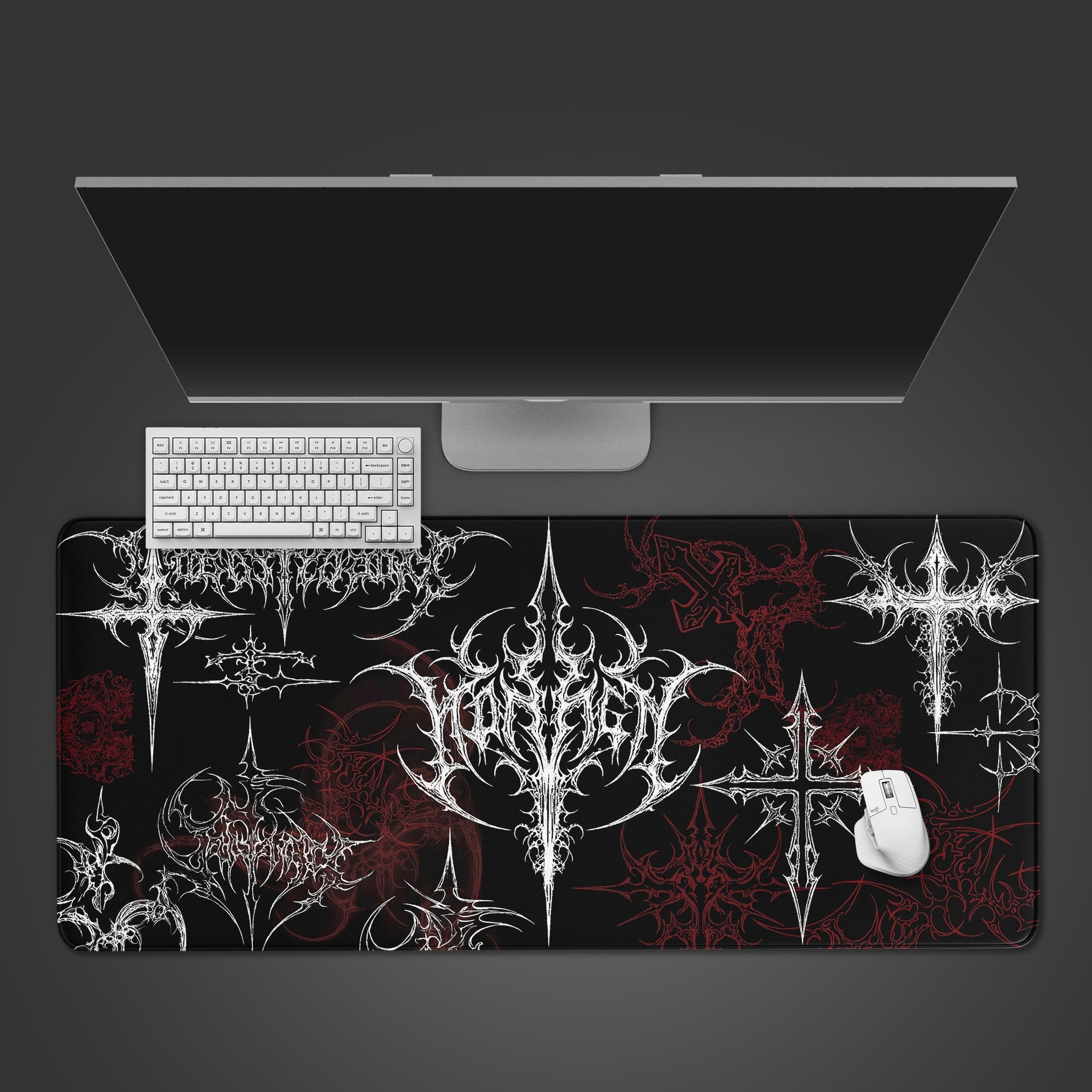 Top-down view of the Fractured Lineage gaming desk mat, featuring its black, white, and red cybersigilism design alongside a white keyboard and mouse. - Epic Design Pads & Mousepads