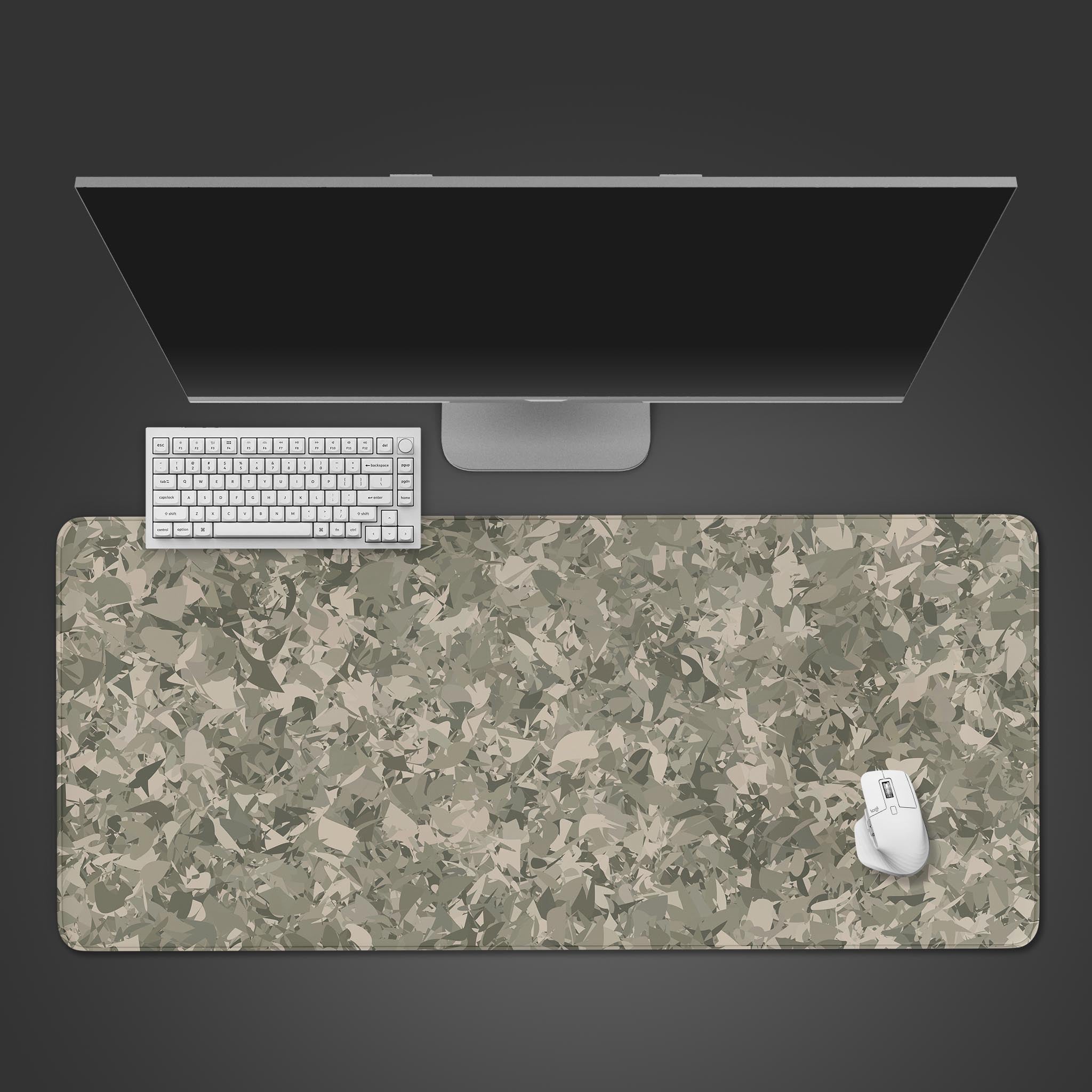 Fragment Camo desk mat with an abstract terrazzo pattern – top-down desktop view with a black keyboard and mouse. - Epic Design Pads