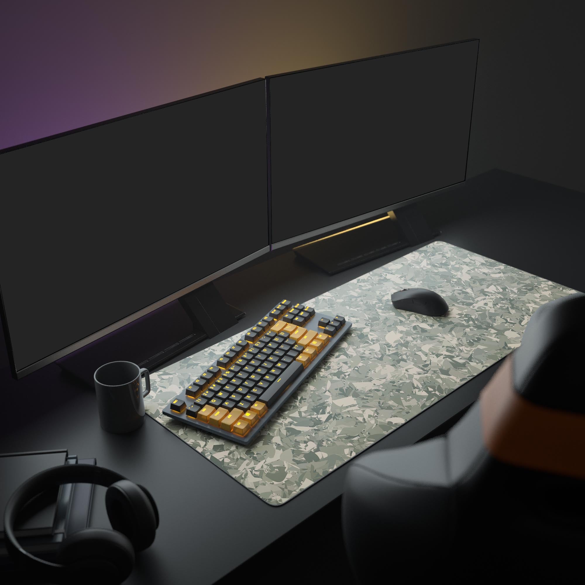 Large Fragment Camo gaming desk mat in a modern setup with a mechanical keyboard, dual monitors, and headphones. - Epic Design Pads