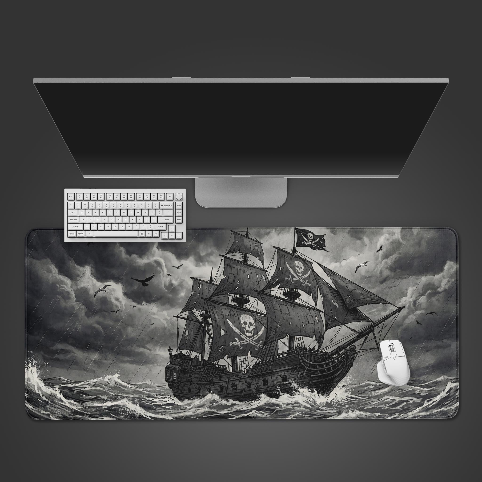 Ghost Ship pirate desk mat with charcoal sketch art of a galleon in a storm. Top-down desktop view with a black keyboard and gaming mouse. - Epic Design Pads & Mousepads