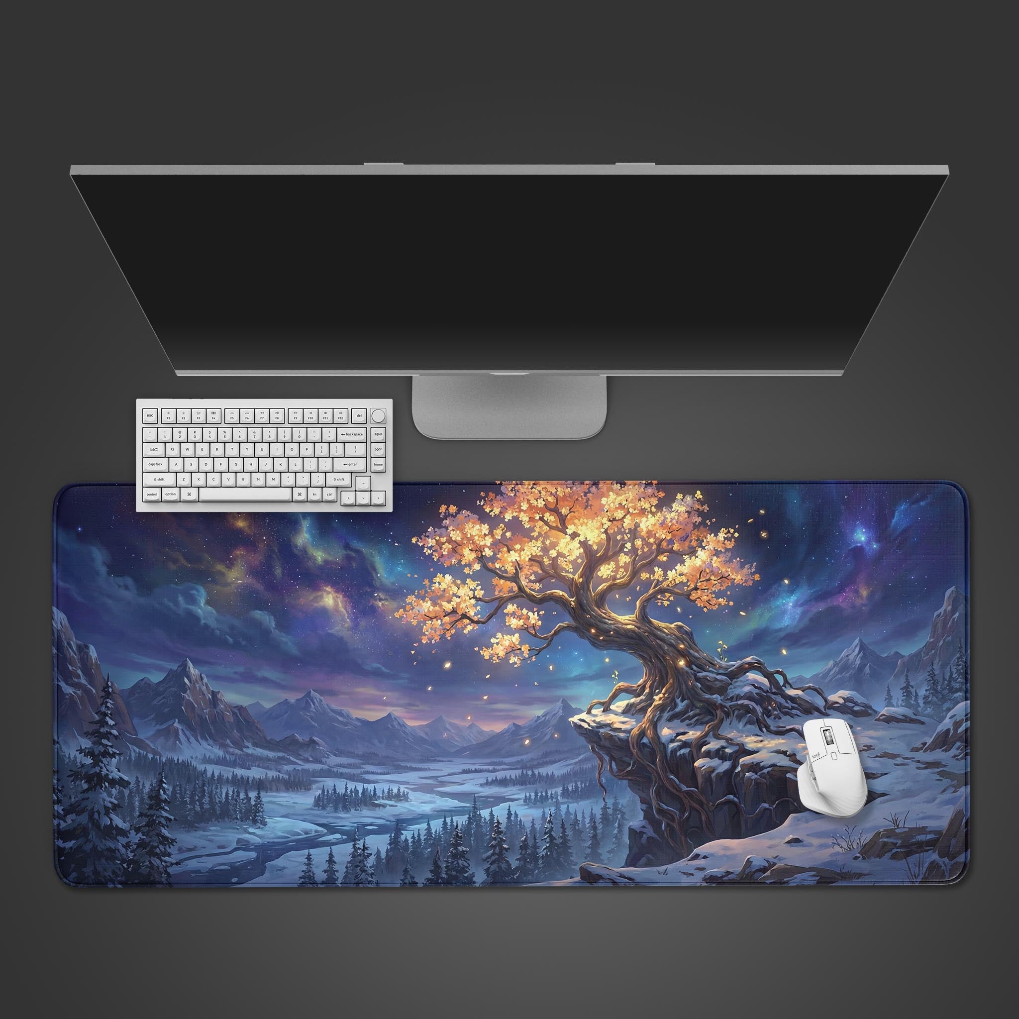 Top-down view of the Golden Solstice gaming desk mat, featuring a glowing fantasy tree in a winter landscape, with a white keyboard and mouse. - Epic Design Pads & Mousepads