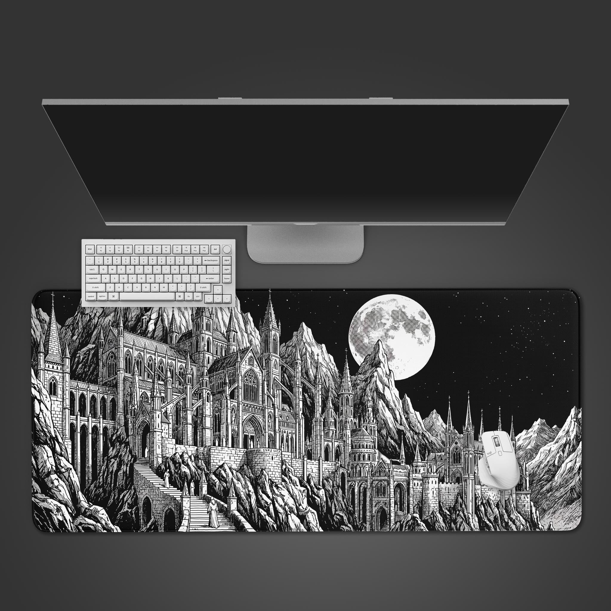 Black and white gothic castle desk mat featuring a giant moon and detailed architectural ink drawing.