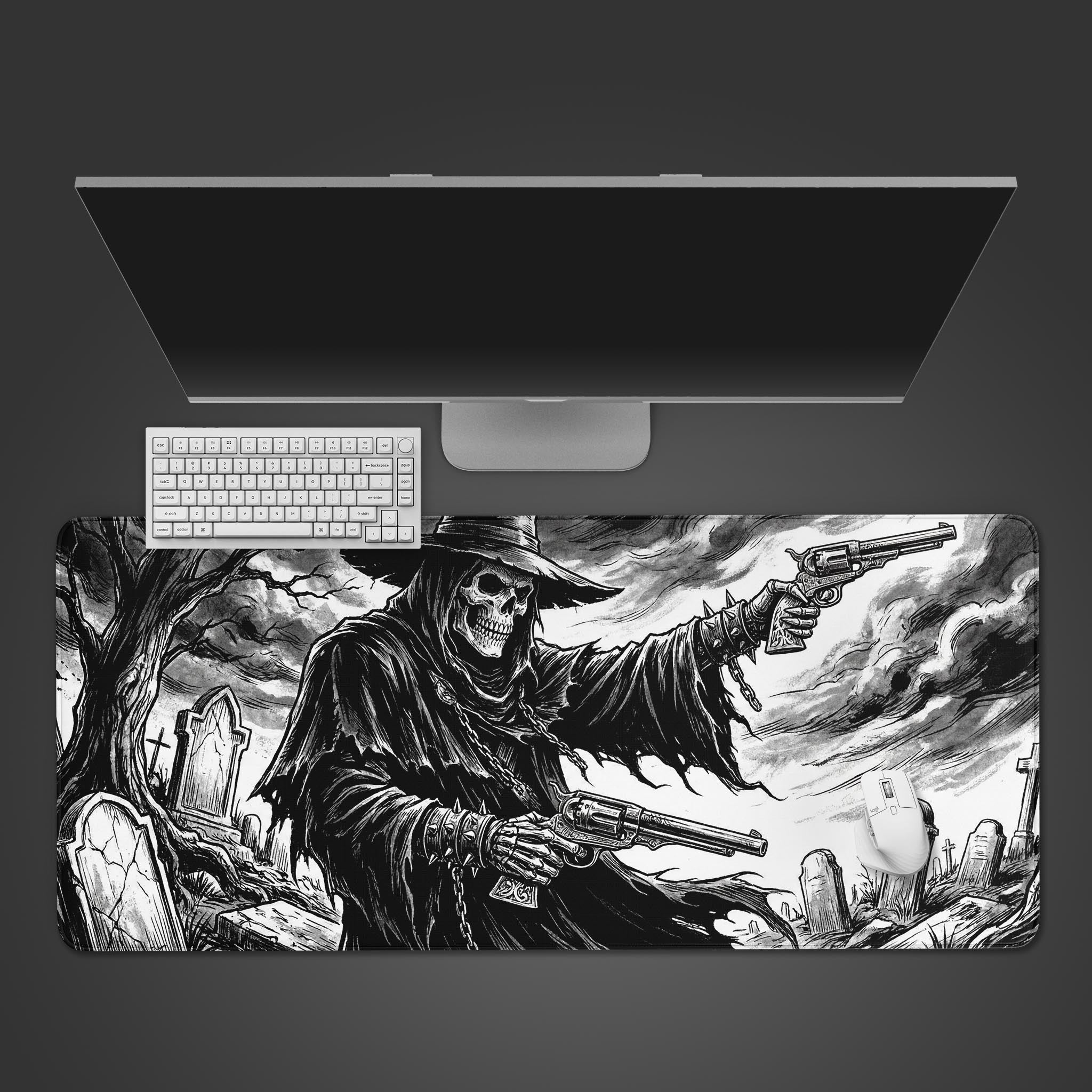 The Gothic Gunslinger gaming desk mat from a top-down view, showing a white keyboard and mouse on its detailed monochrome Reaper design. - Epic Design Pads & Mousepads