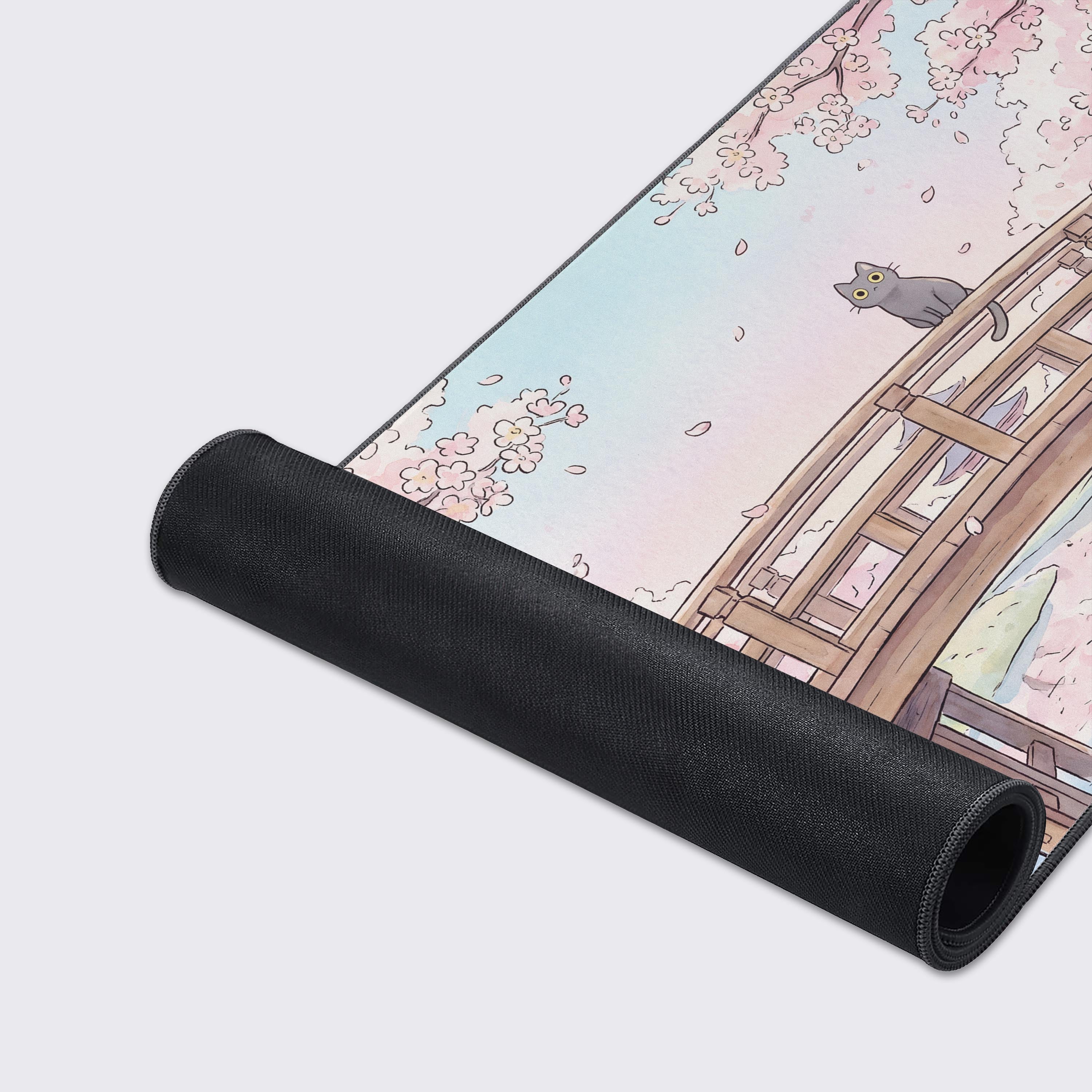 Features of the Sakura Bridge Cat mouse pad highlighting non-slip base, water resistance, and smooth surface
