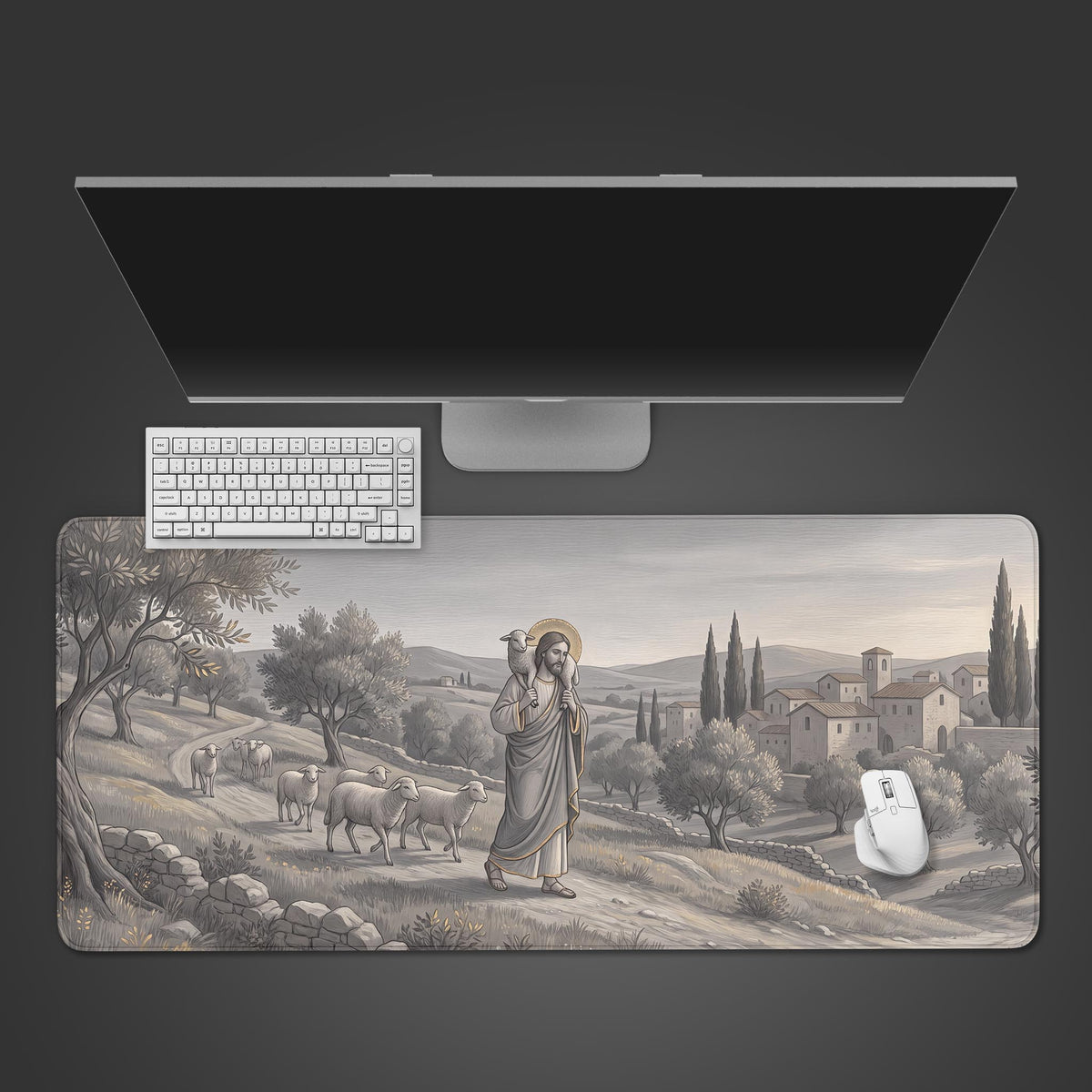 Full view of the desk mat featuring a gray vintage illustration of Jesus as the Good Shepherd walking with a flock of sheep through a pastoral landscape