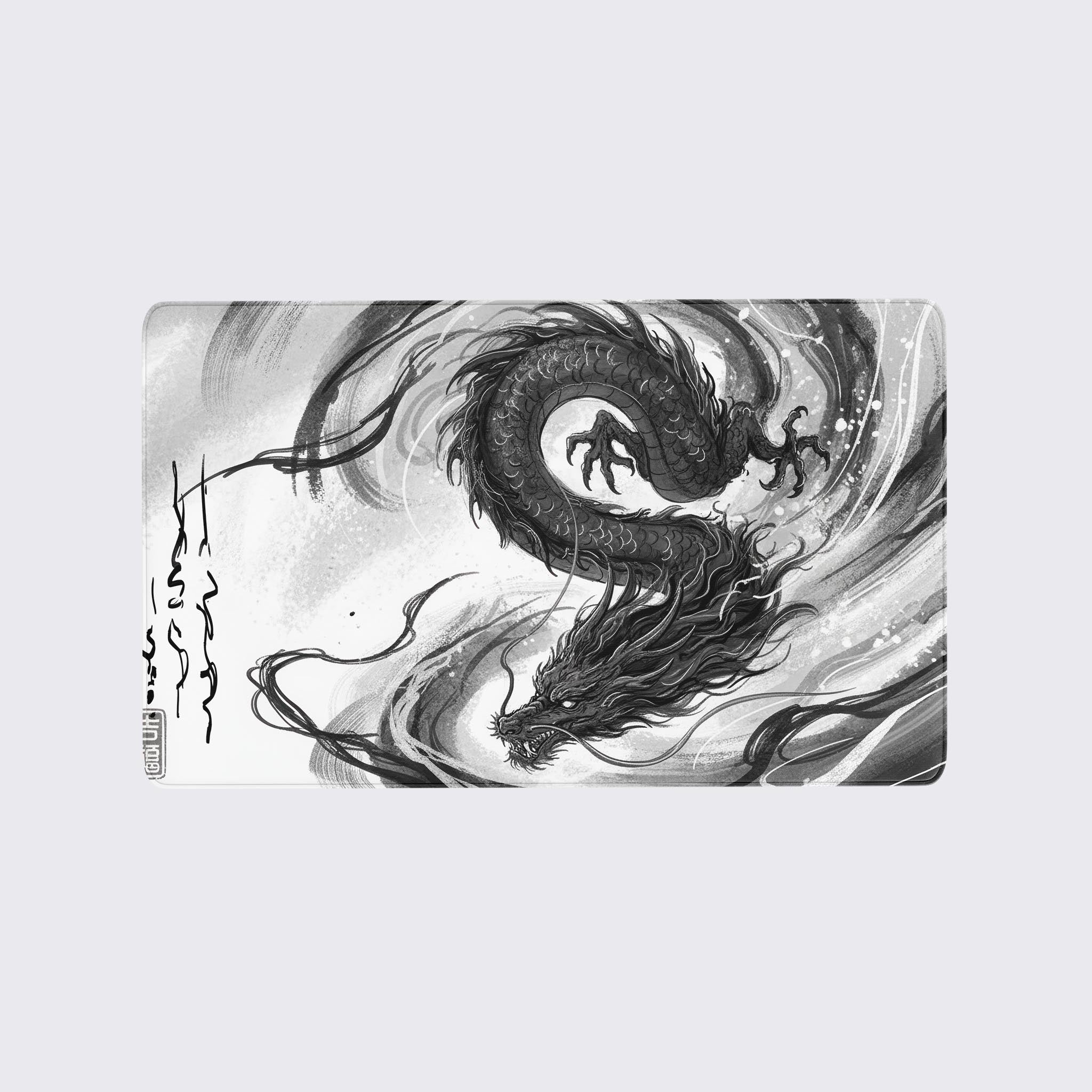 Ink-wash style black dragon playmat with swirling brushstrokes and calligraphy on a white background - Epic Design Pads & Mousepads