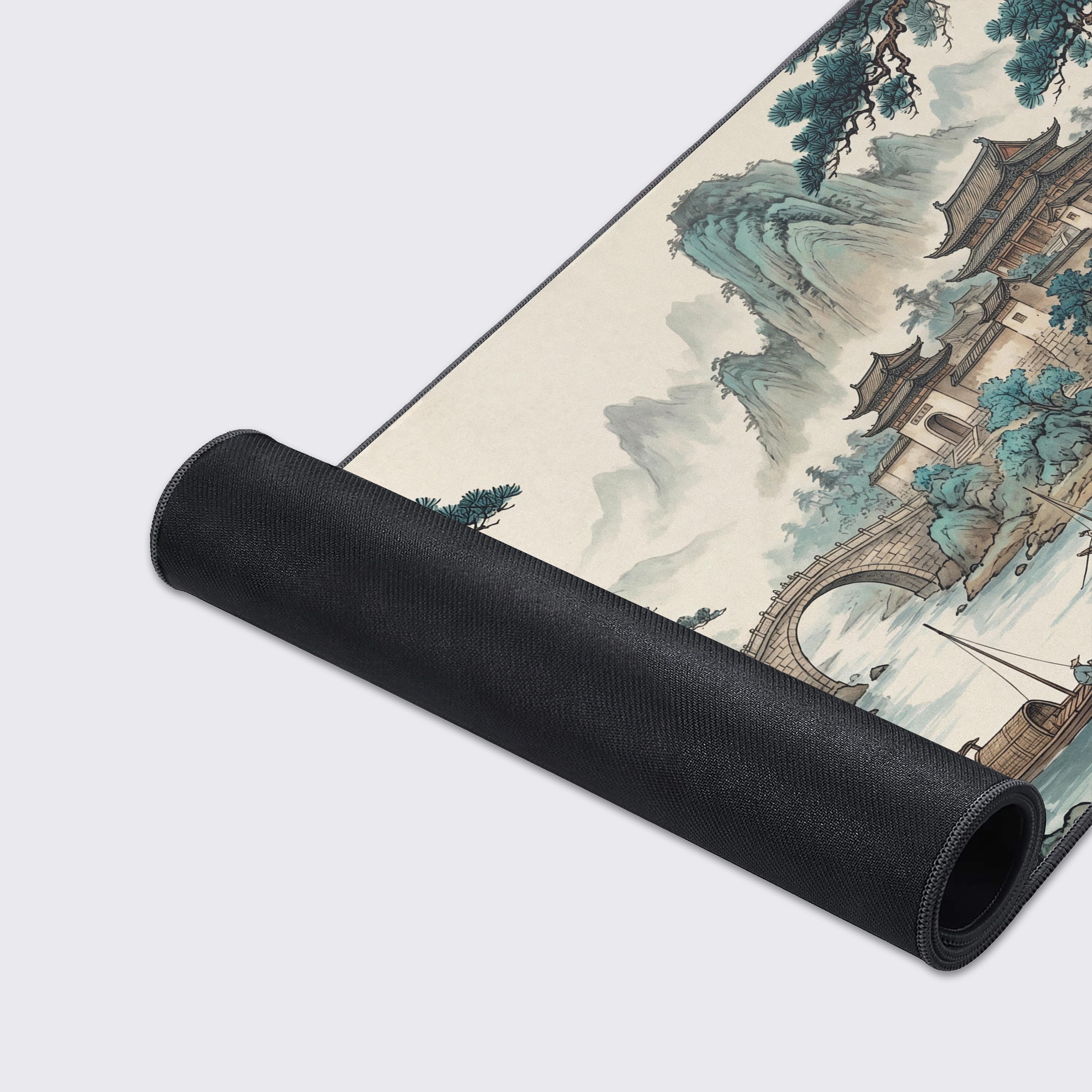 Wide view of the Jade River Valley XL mouse pad showcasing the full scenic waterfall and village design.