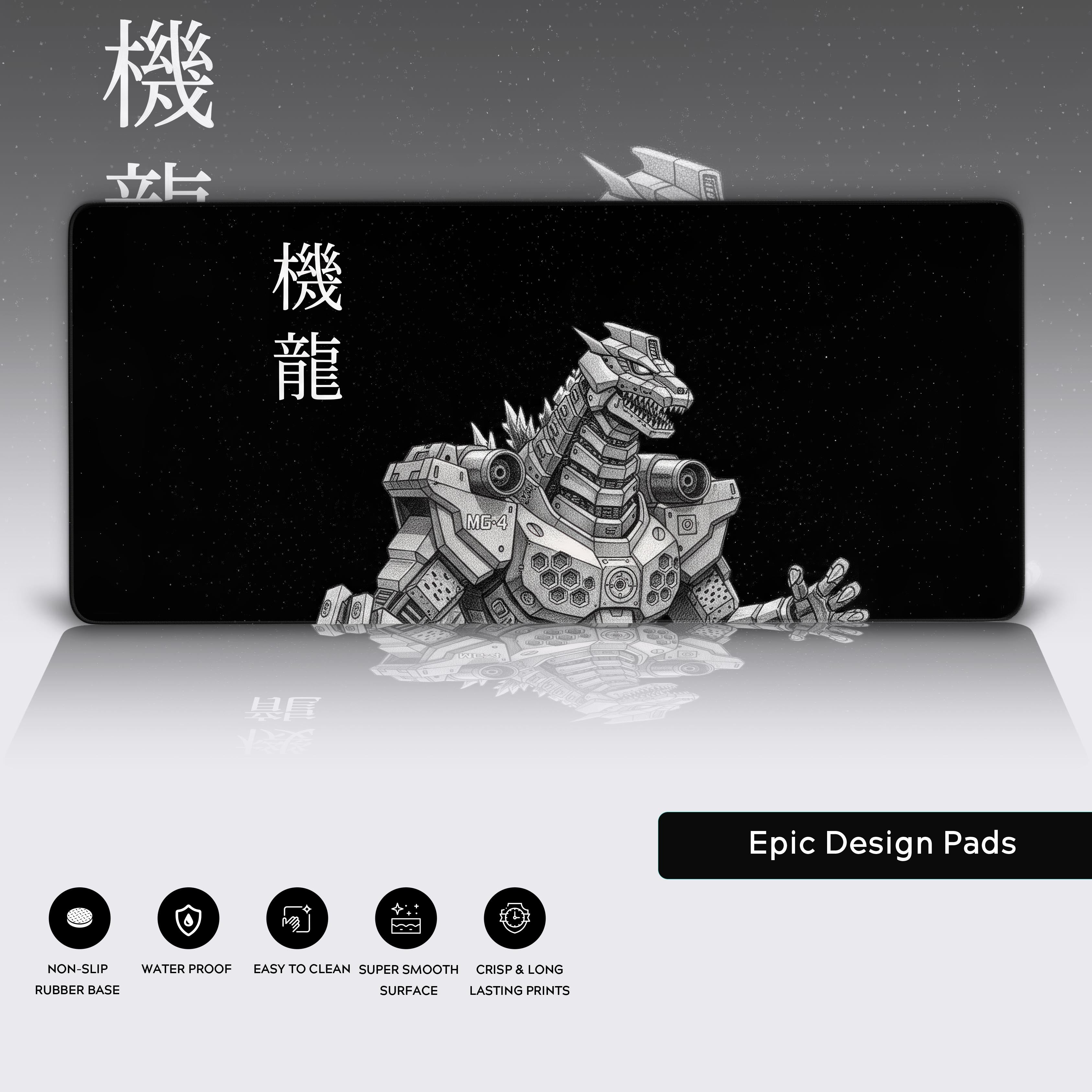 Large Kiryu MechaGodzilla gaming desk mat in a full desk setup with dual monitors, a mechanical keyboard, and headphones. - Epic Design Pads