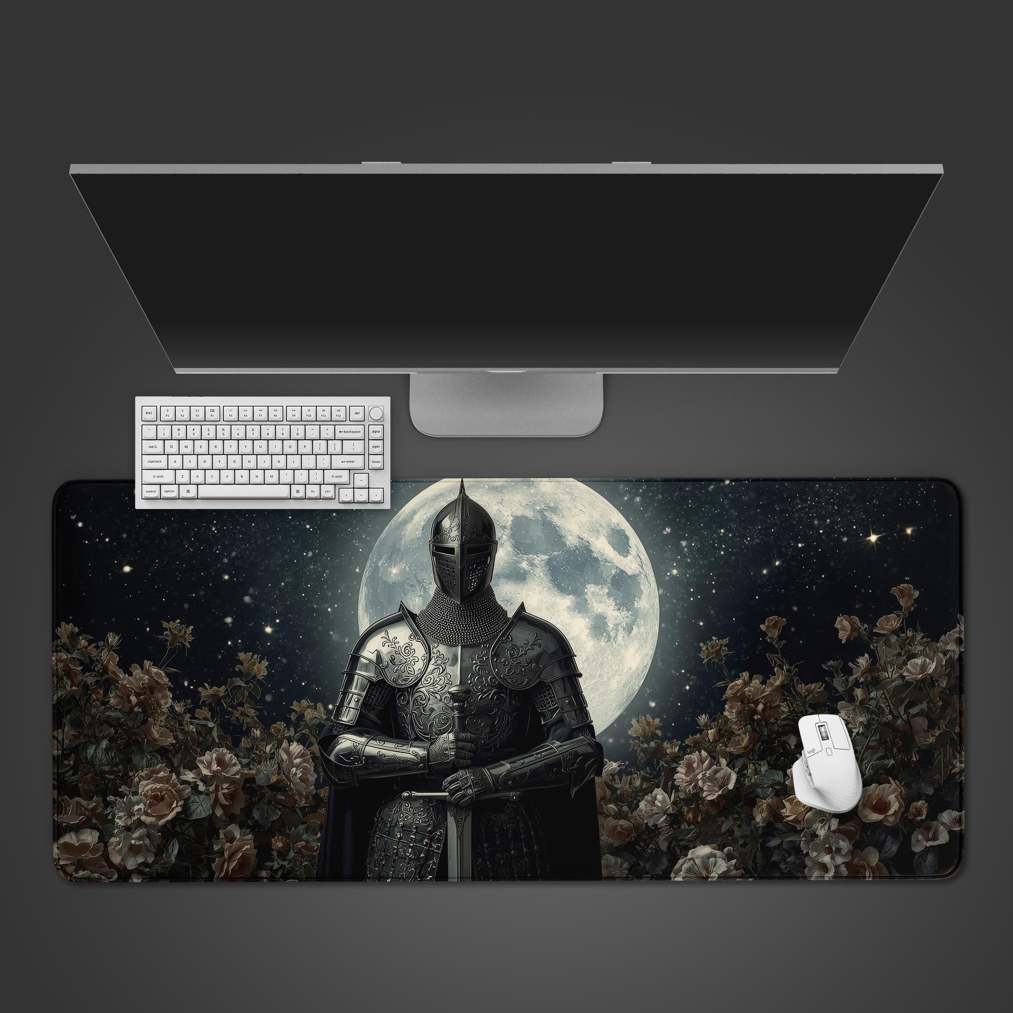 Knight's Vigil gaming desk mat with moonlit knight and rose design, shown on a desk with a keyboard and mouse. - Epic Design Pads