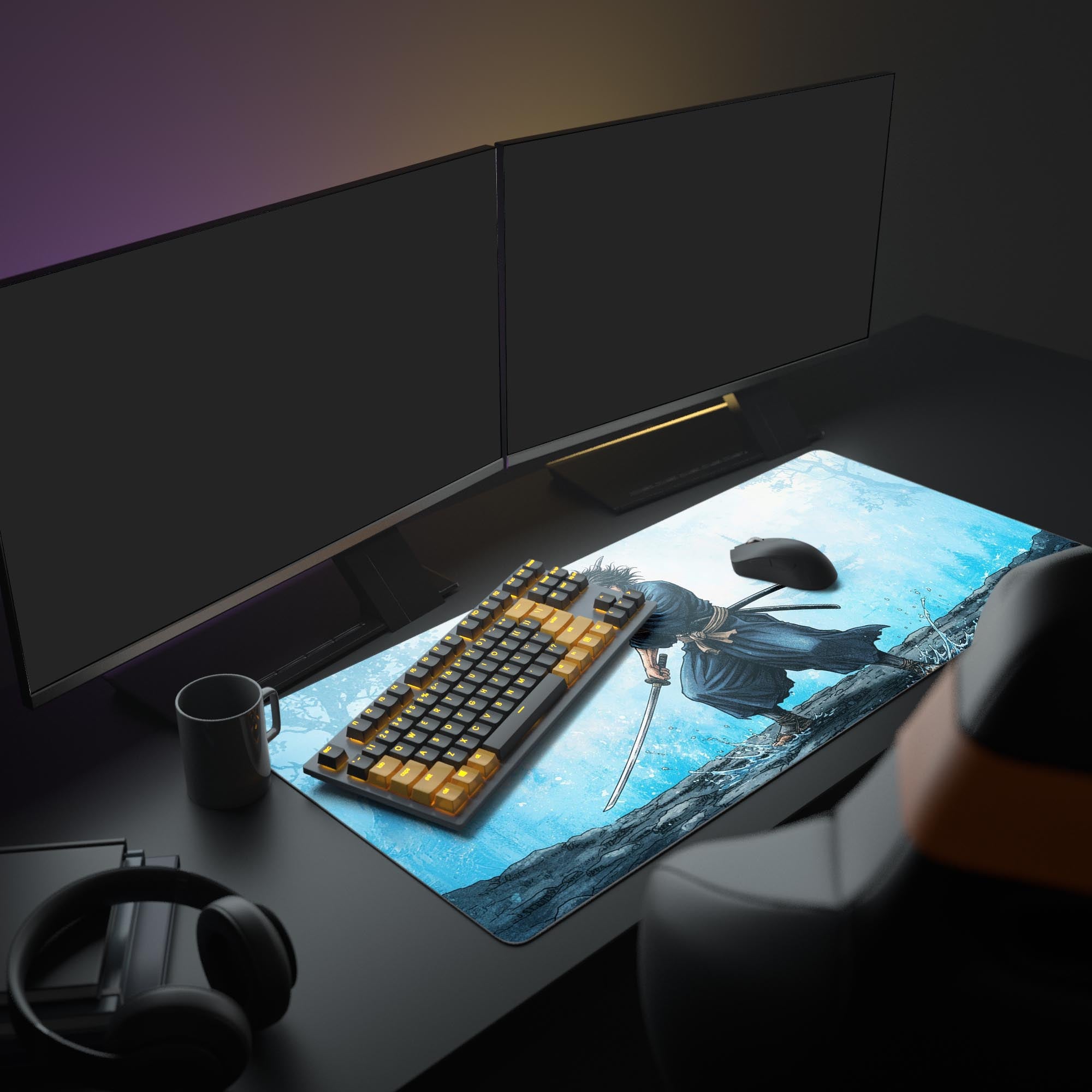 The Legendary Swordsman desk mat in a full gaming setup with dual monitors, a mechanical keyboard, and headphones, showcasing its large size and Japanese ink wash aesthetic. - Epic Design Pads