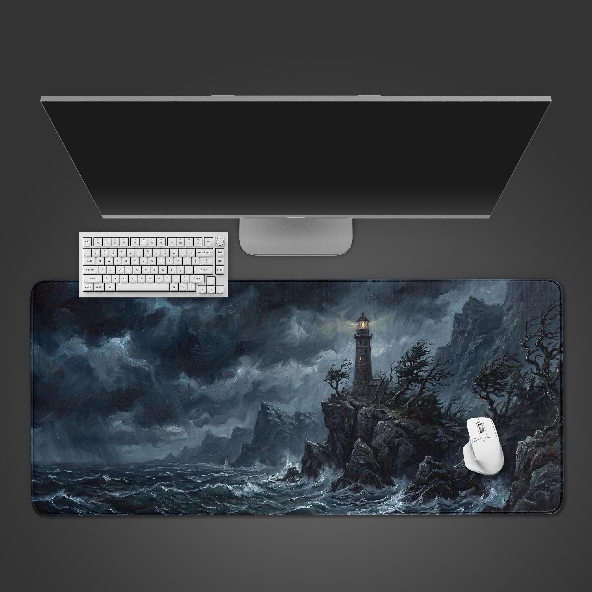 Stormy lighthouse desk mat featuring a rugged cliff and crashing ocean waves